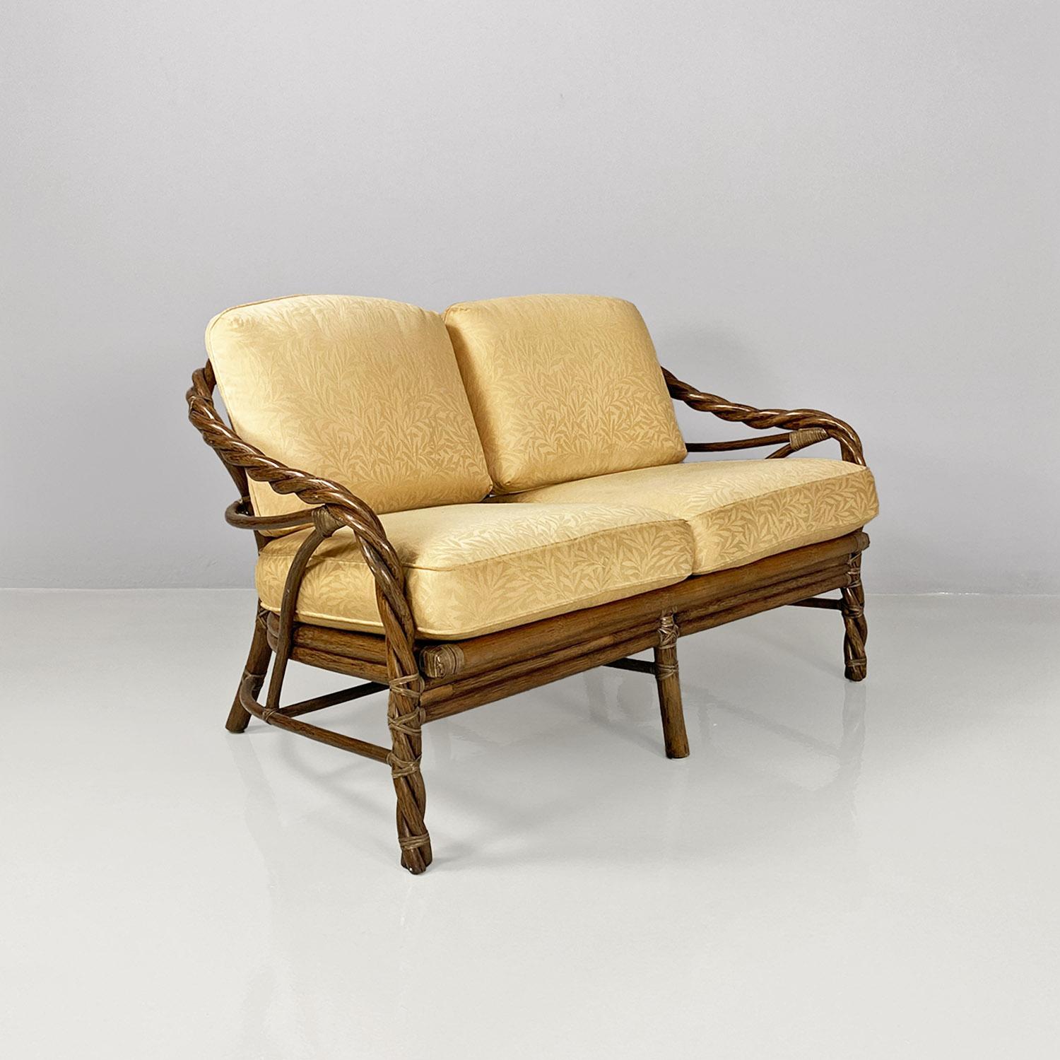 Modern American modern rattan and beige floreal fabric sofa by McGuire Company, 1970s For Sale