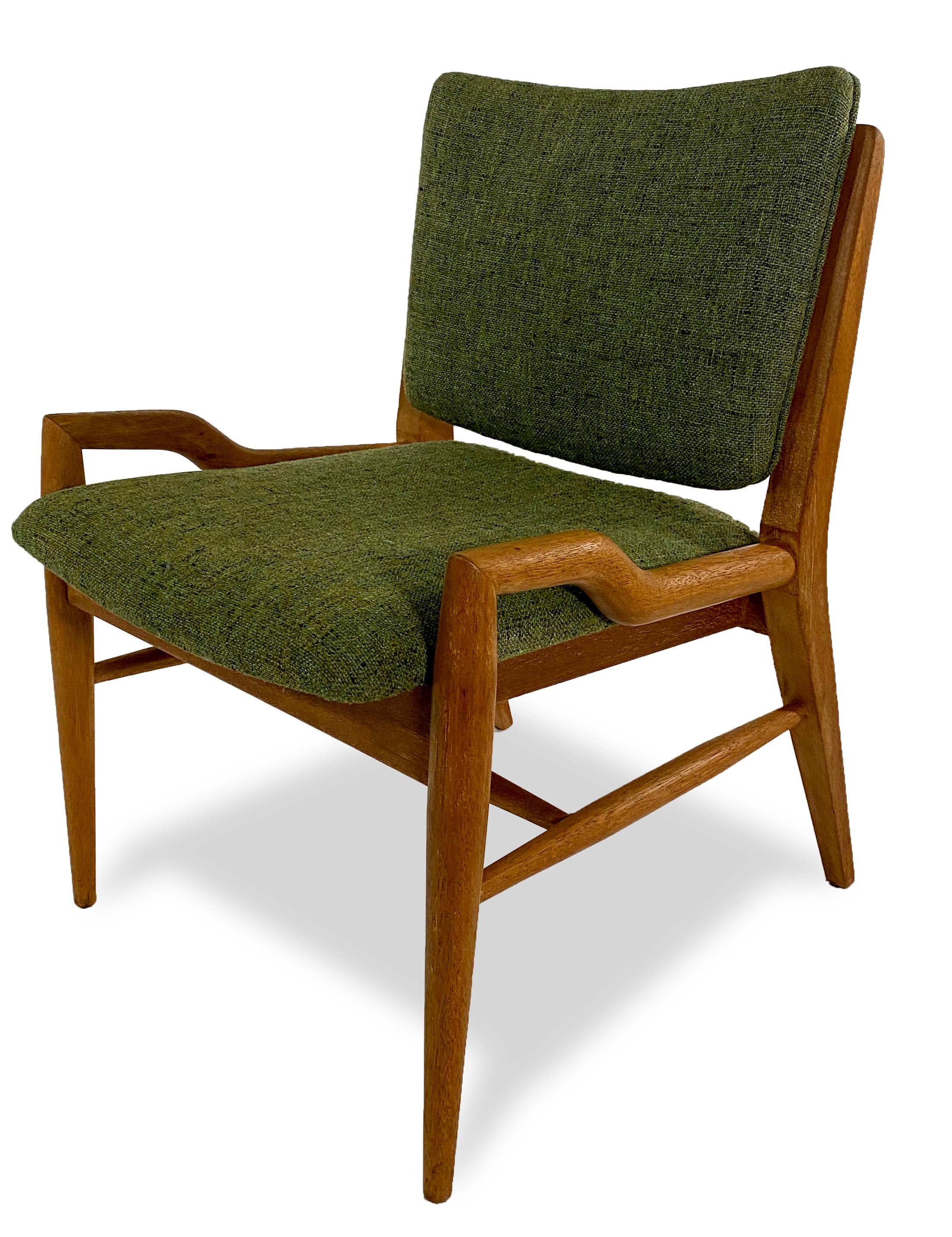 A set of 6 modern American armchairs by John Keal for brown saltman. Original green fabric, stylized lower arm on all chairs, Curved detailing on the back of the chair. Mahogany. Sold as set of 6. Measure: Seat height 17