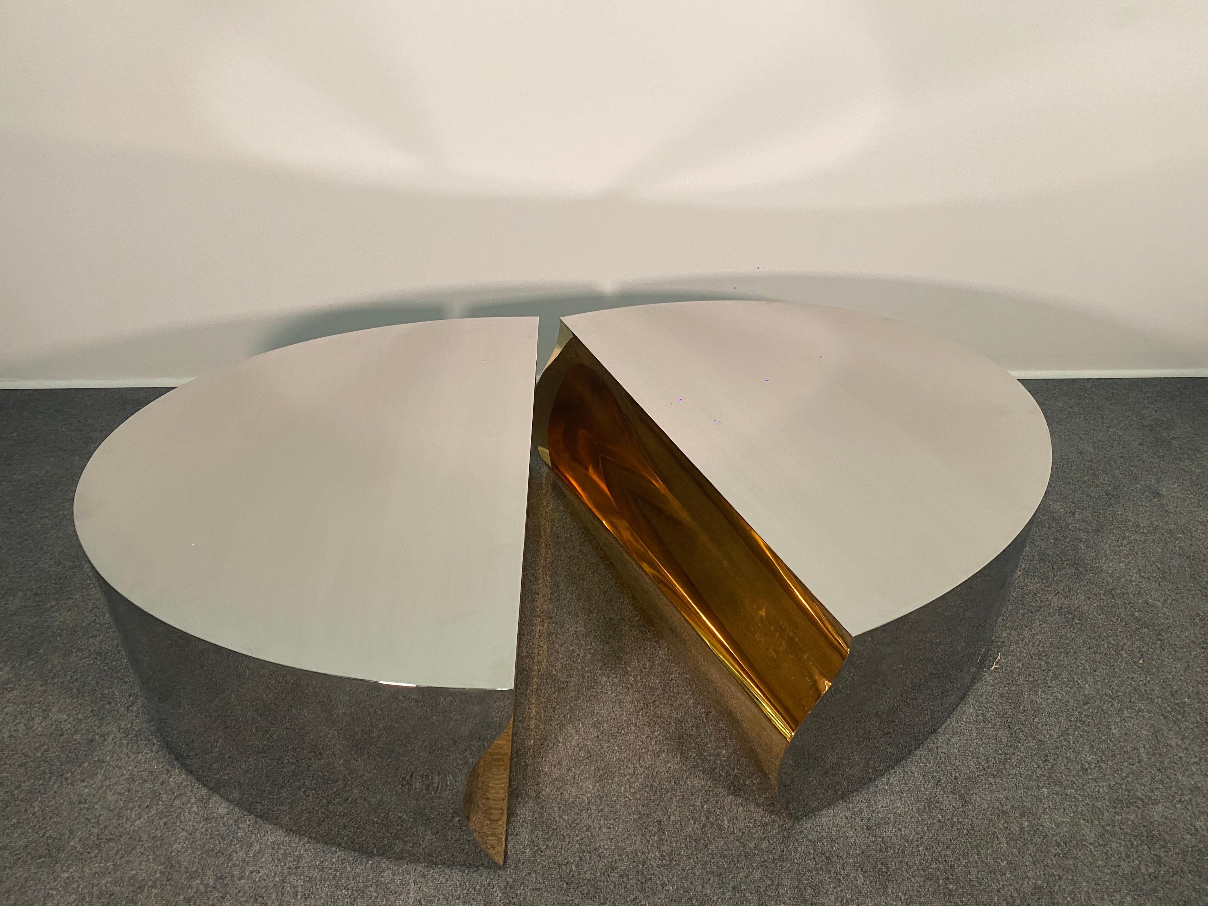 K.S. Mark V - American Modern Mirror Polished Stainless Steel Polished Bronze Center Detail Recessed Casters Freeform Cocktail Table.
 
Shipping is $900.00 
