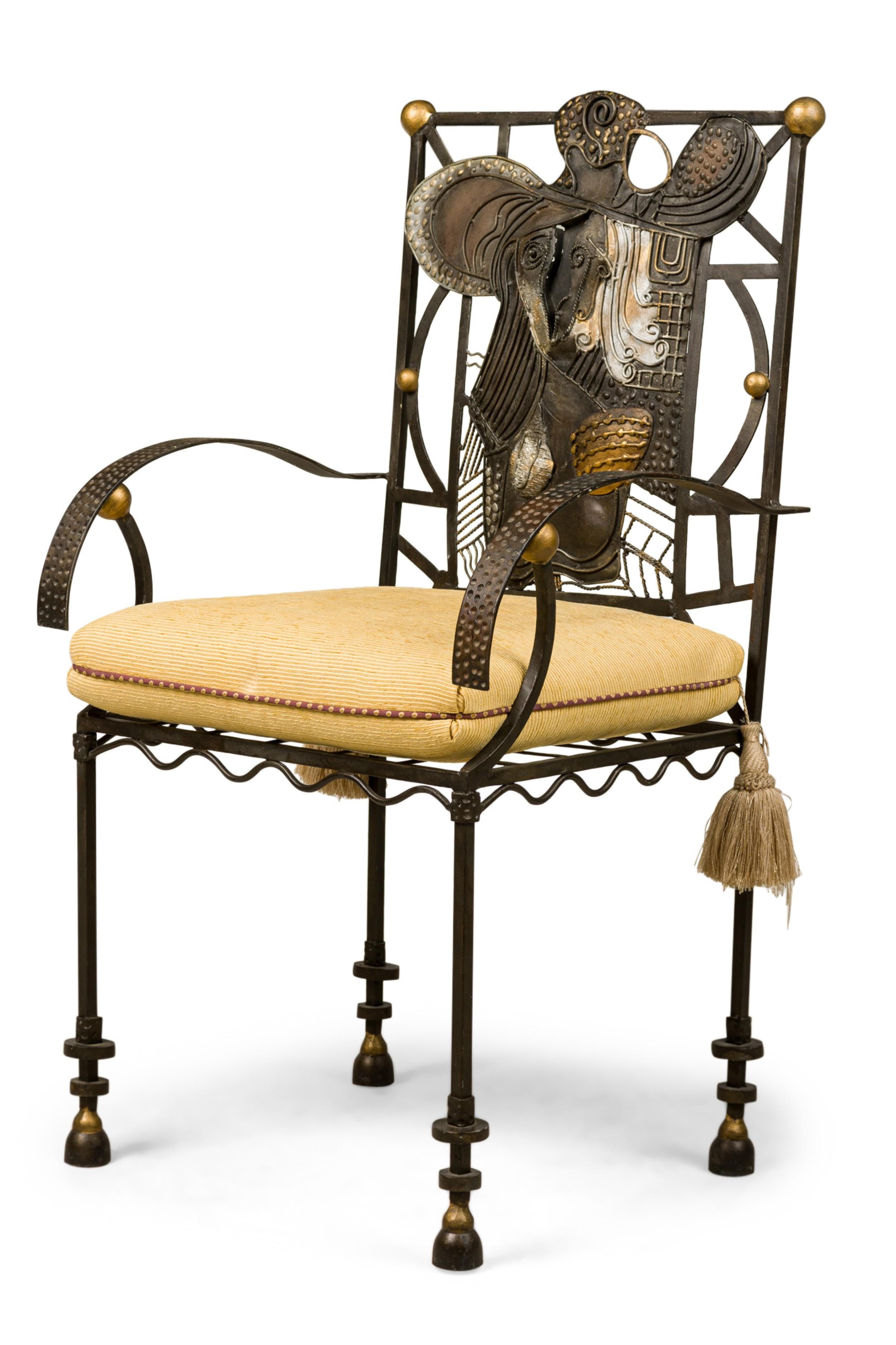 American Modern surrealist armchair with a parcel gilt steel frame featuring applied abstract back design and an upholstered seat.

Condition: Good; Wear consistent with age and use