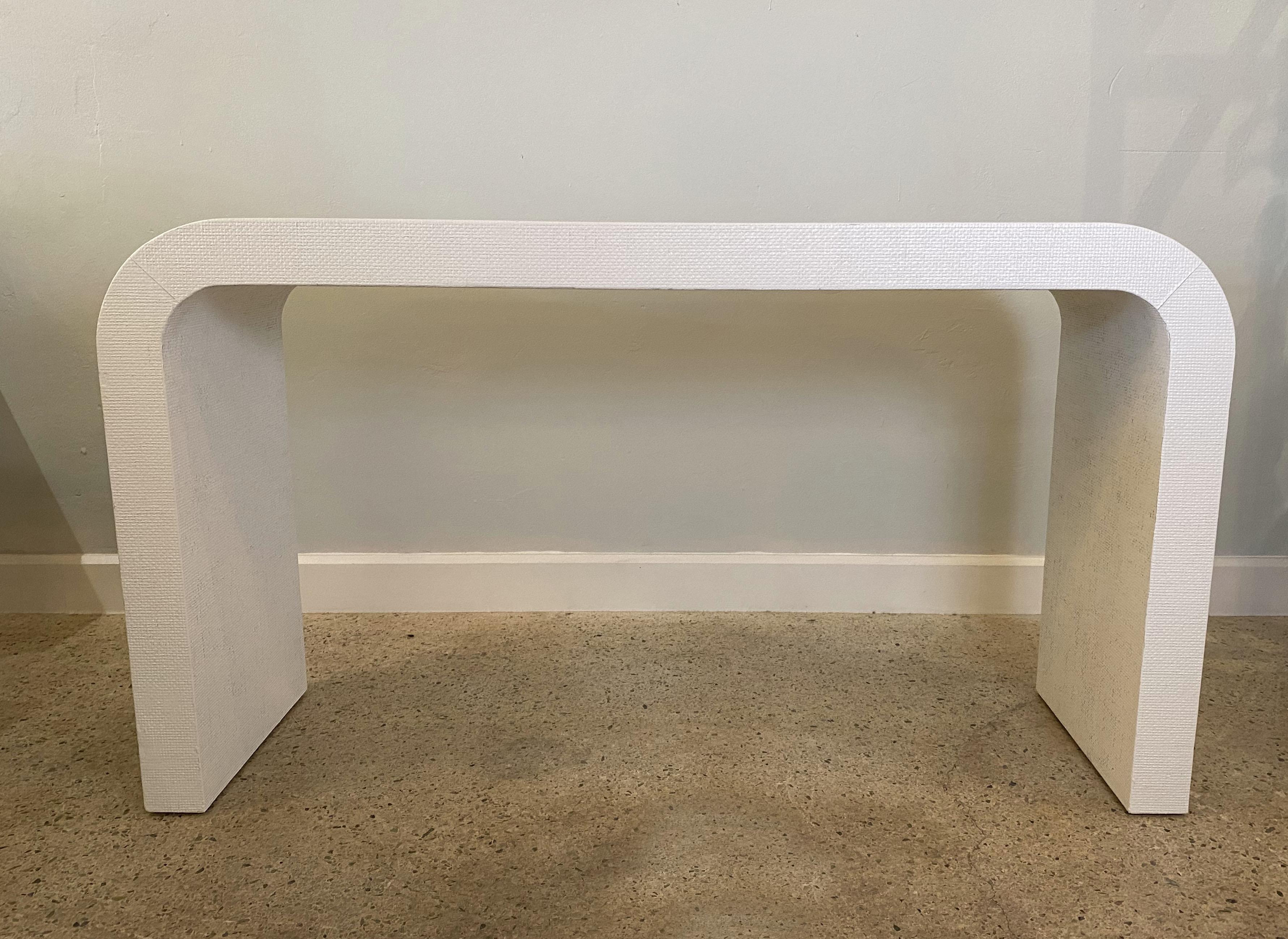 A beautiful example of a Classic table in white Murano linen. Original receipt from Karl Springer accompanies this piece.
  