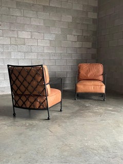 American Modernist Iron and Leather Lounge Chairs After Jean Royére, by Baker