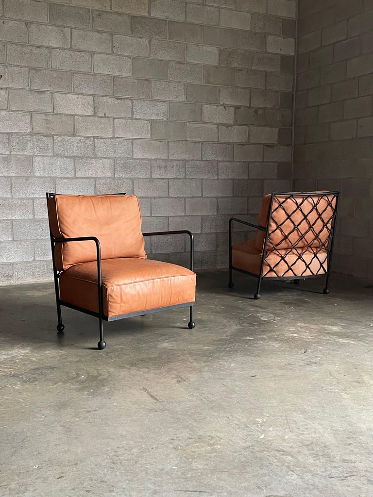 Late 20th Century American Modernist Iron and Leather Lounge Chairs After Jean Royére, by Baker For Sale