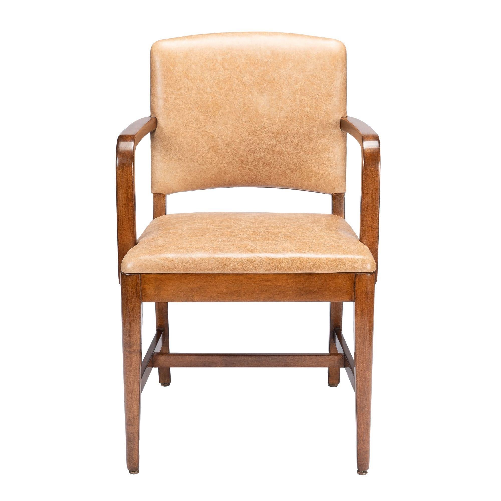 American Modernist maple armchair. The chair seat and back have been re-upholstered in natural buff colored Italian oil tanned leather. The upholstered back panel has a slight concave construction with a faintly bowed crest rail. The upholstered