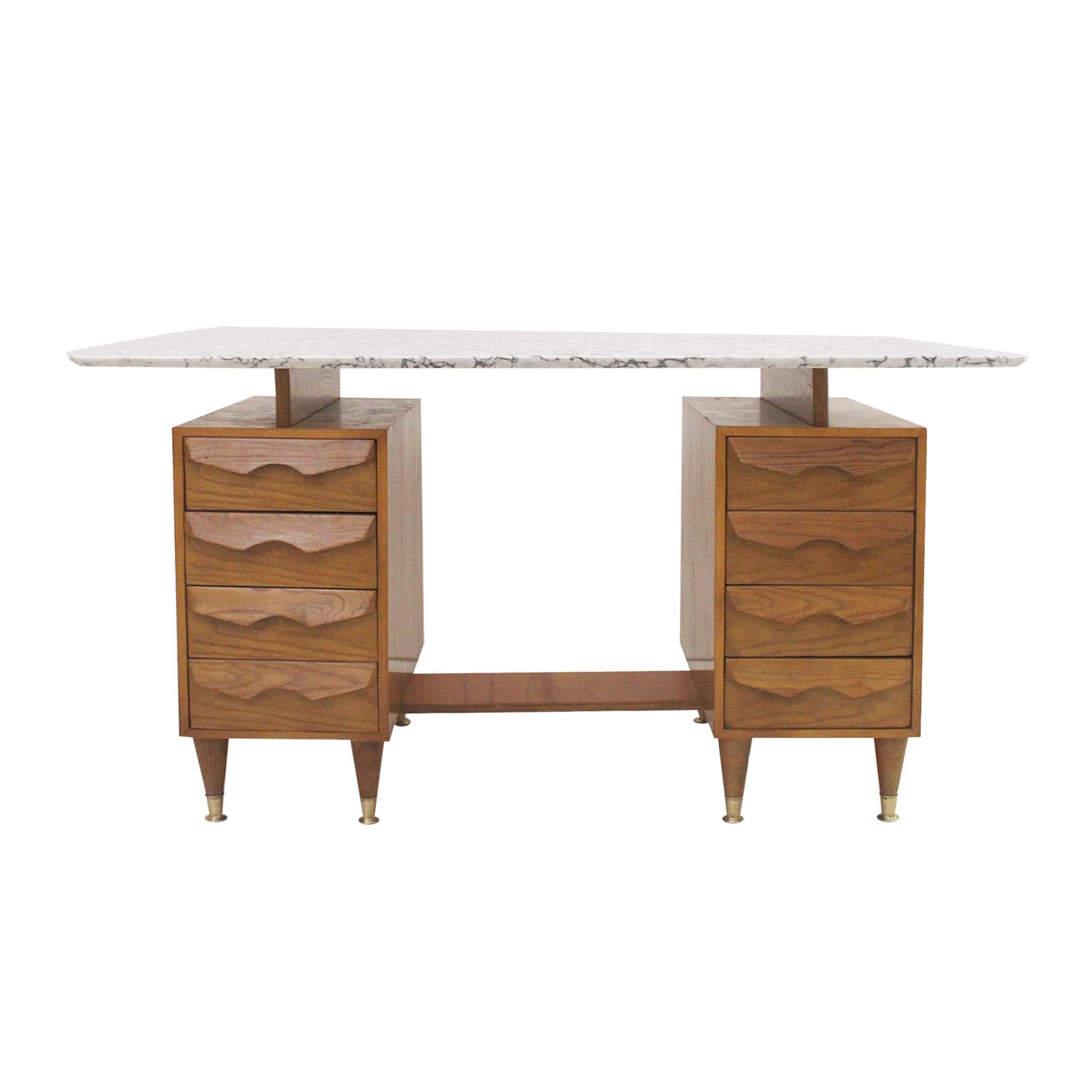 American oak and birch desk composed of two bodies with four drawers each. Portuguese pink marble on top. Conical legs with brass details.

Every item LA Studio offers is checked by our team of 10 craftsmen in our in-house workshop. Special