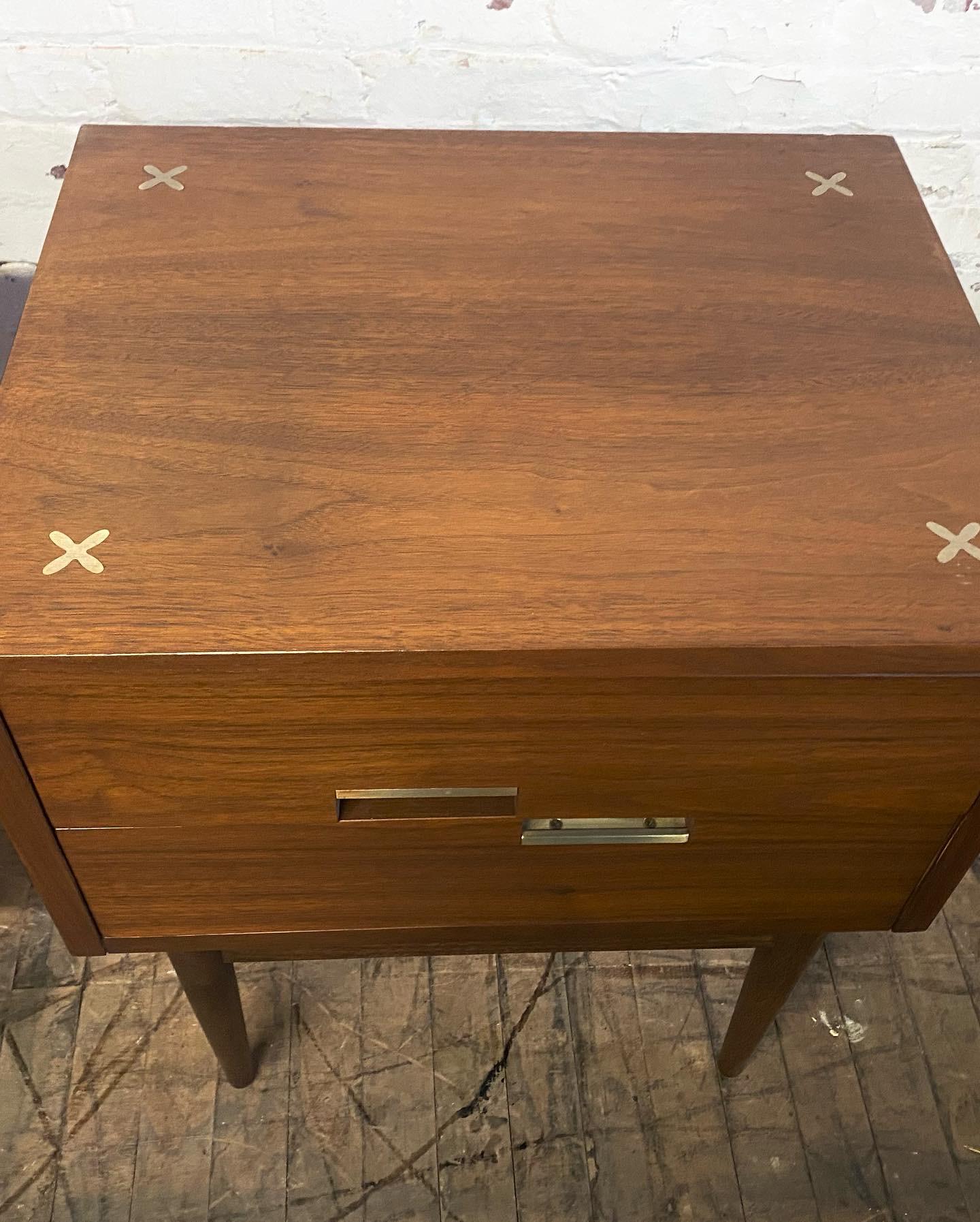 Handsome nightstands or end tables from American of Martinsville and Merton Gershun’s Accord line of furniture with their signature X’s and asymmetric handles, nice original condition, patina.