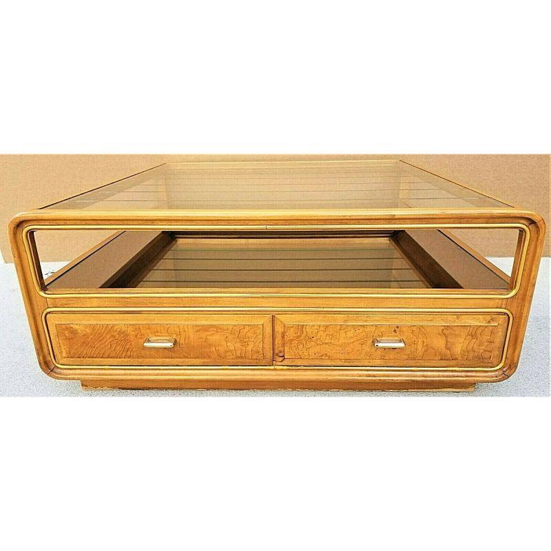 Offering One Of Our Recent Palm Beach Estate Fine Furniture Acquisitions Of An Exceptional Mid Century Modern American of Martinsville 2 tier burl wood, glass and mirror coffee cocktail table

Features 2 drawers with solid brass hand pulls, a