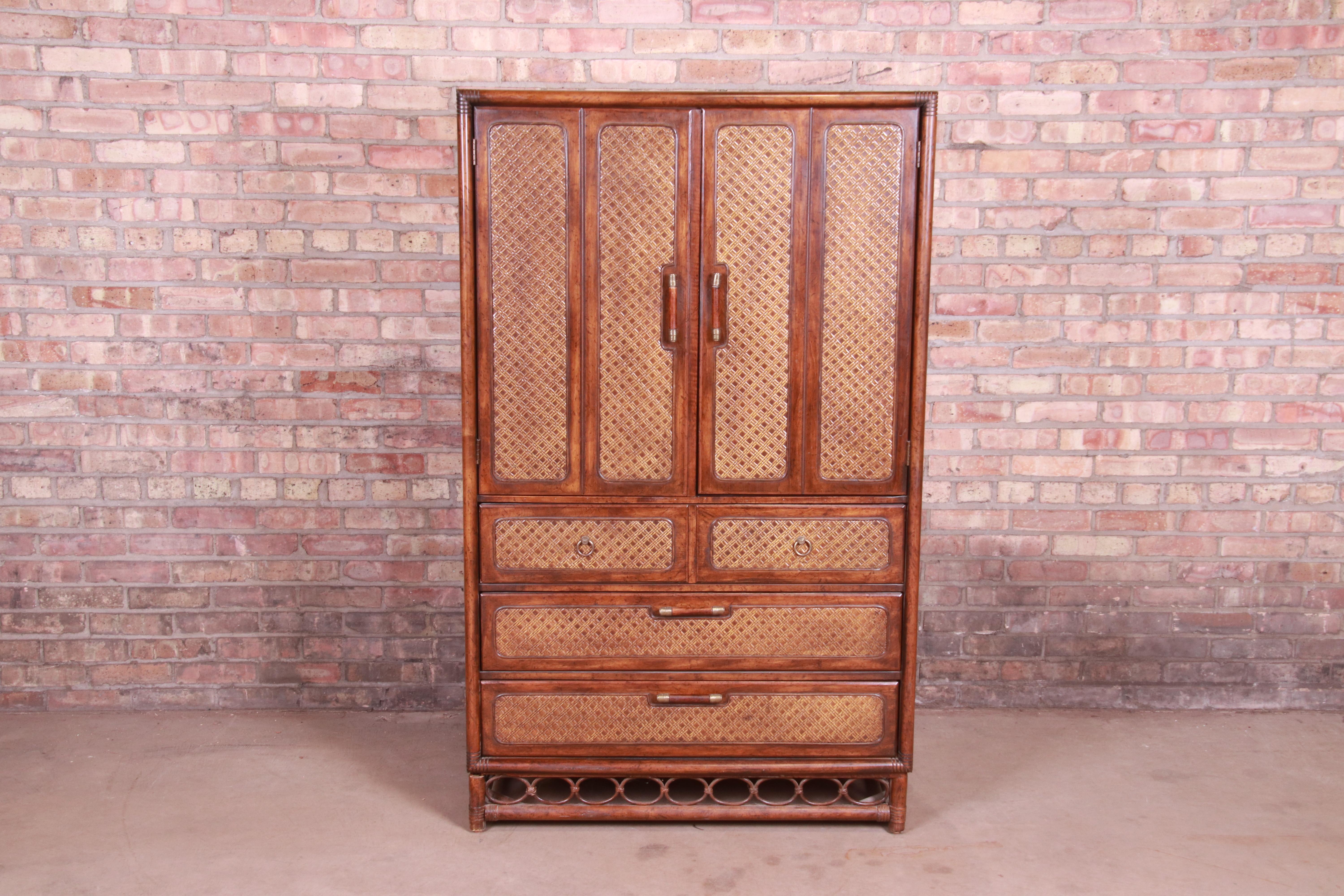 A gorgeous Mid-Century Modern Hollywood Regency highboy dresser chest.

By American of Martinsville,

USA, circa 1960s

Walnut, with woven rattan panels, bamboo base, and original brass hardware.

Measures: 38