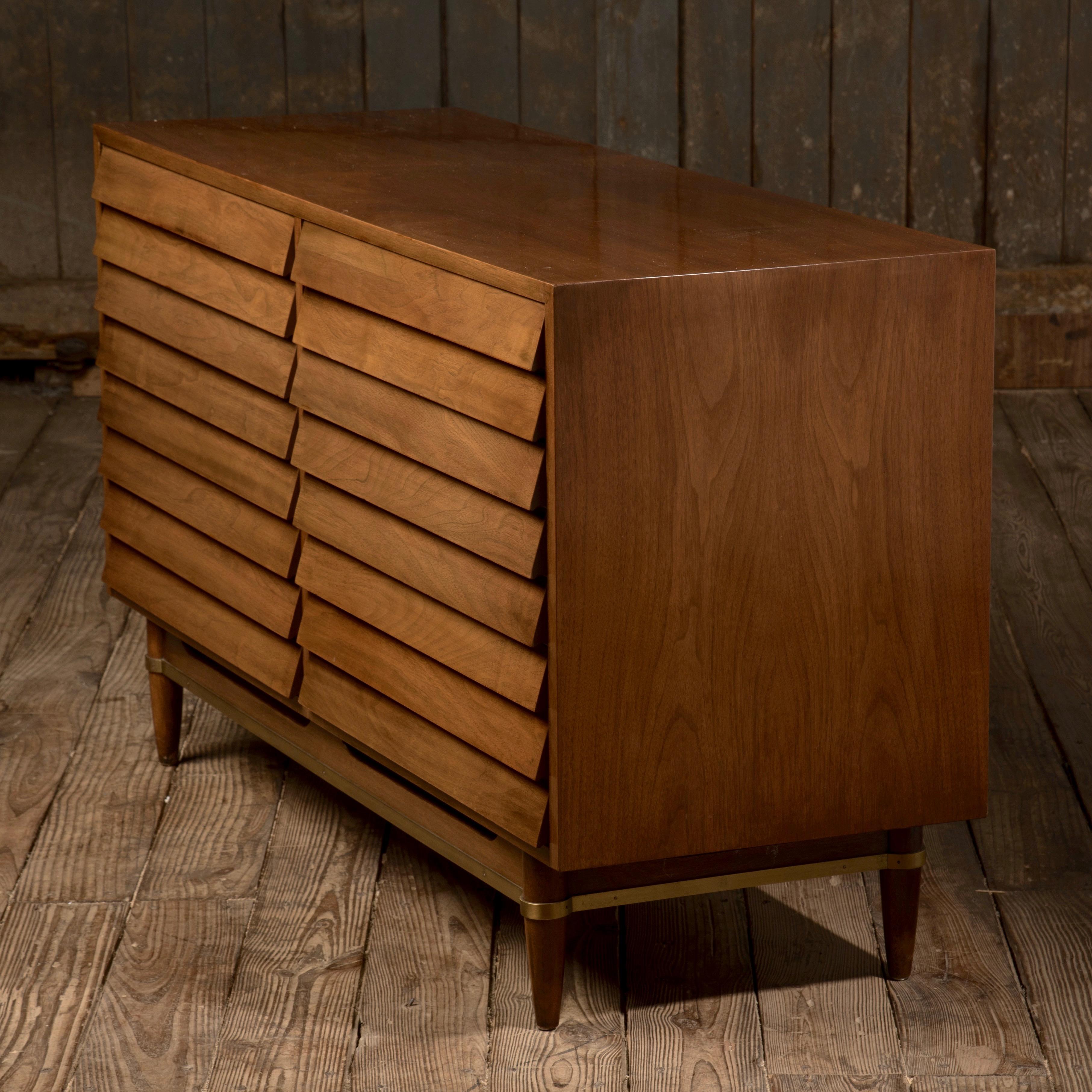 Very sophisticated dresser, chest of drawers or credenza by Mid-Century Modern designer Merton L. Gershun for American of Martinsville's Dania line, having stunning walnut louvre front with six dovetailed drawers.
