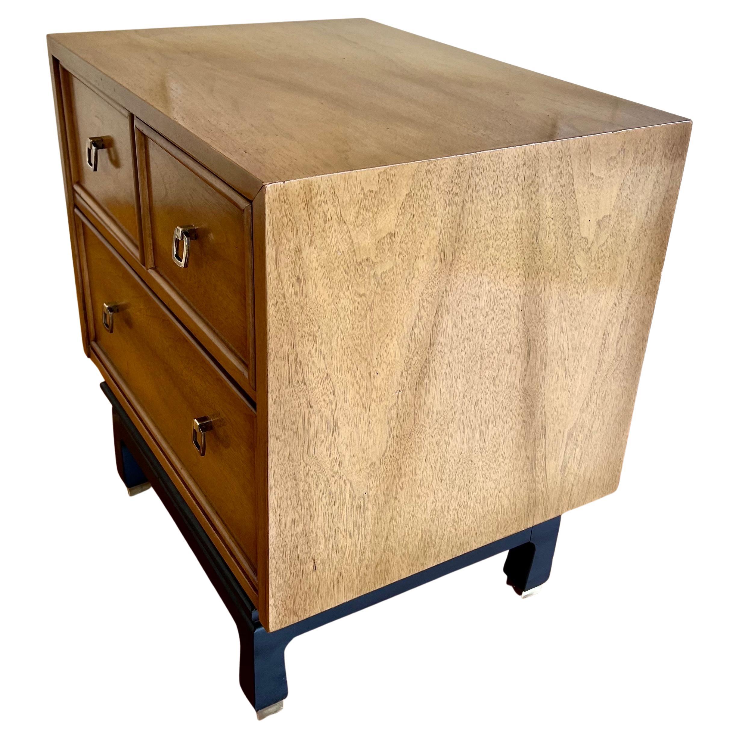 Beautiful elegant Mid-Century Modern nightstand by American of Martinsville, circa 1960's original bleached mahogany finish with black lacquered base and polished brass handles and legs tips, very clean and nice condition.