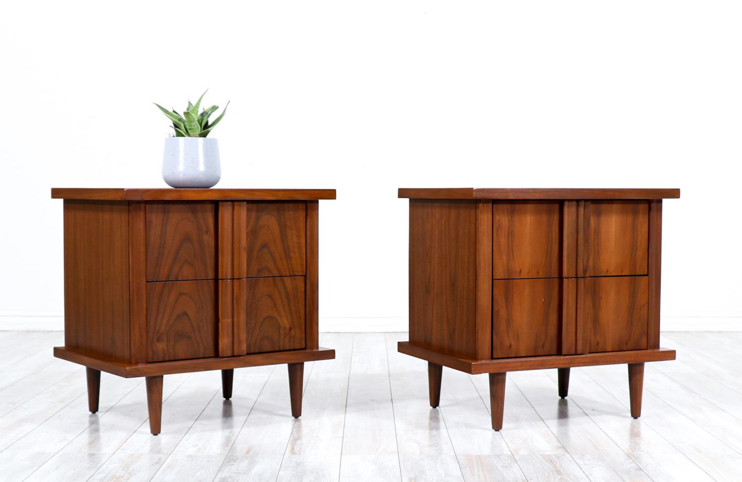 American of Martinsville sculpted walnut night stands.