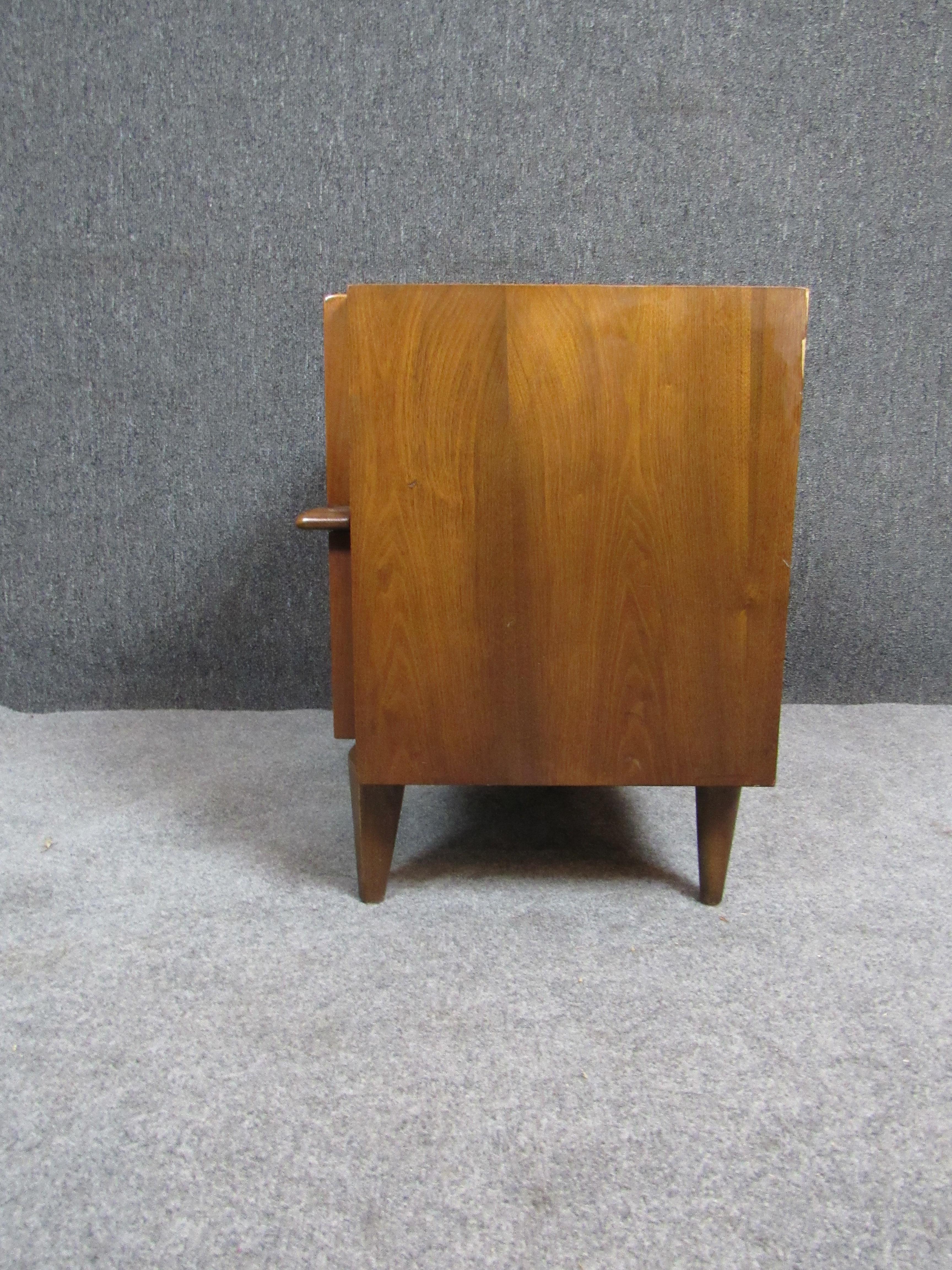 20th Century American of Martinsville Sculpted Walnut Nightstand For Sale