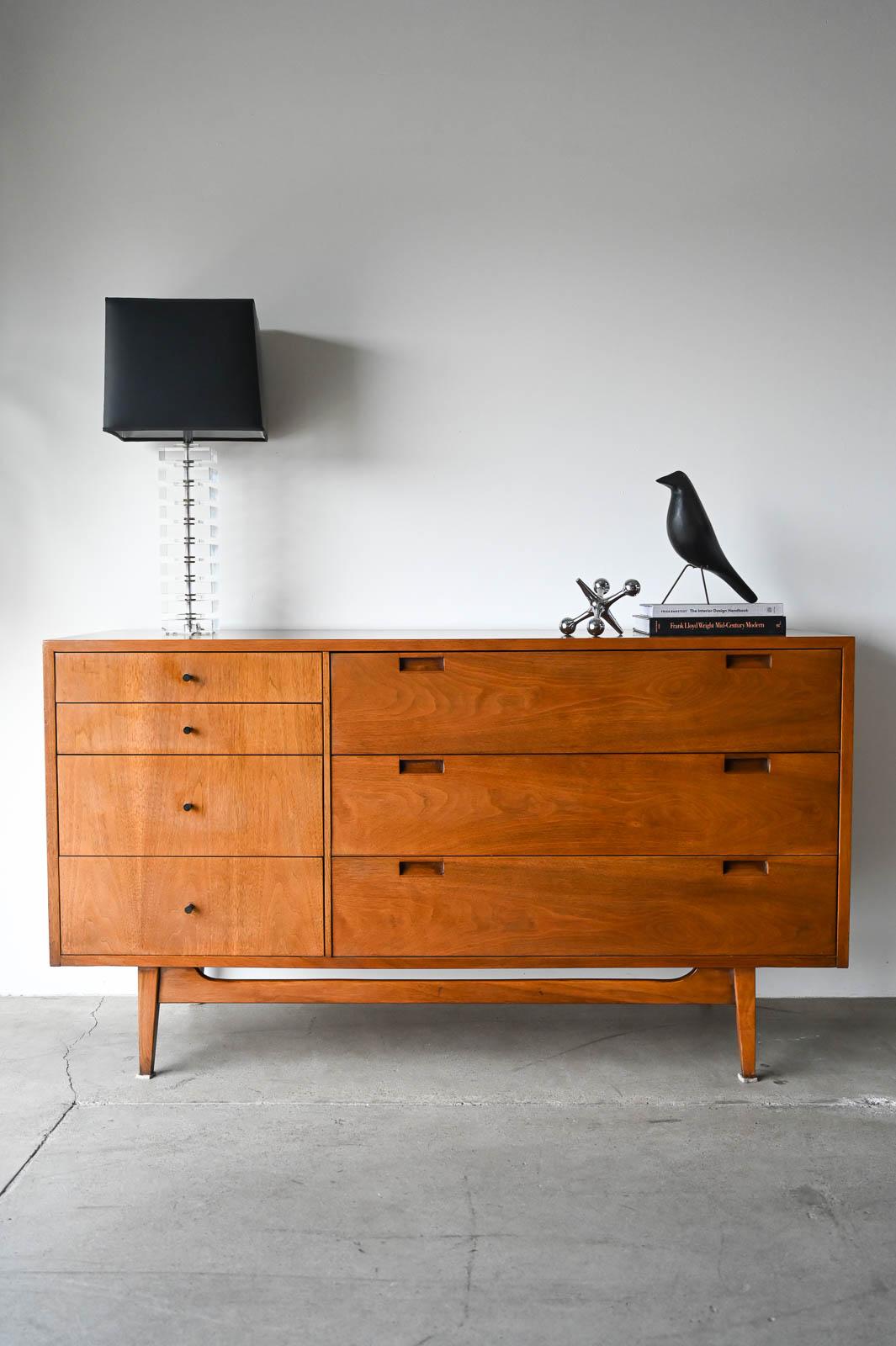 American of Martinsville Walnut Dresser or Credenza, ca. 1960.  Beautiful american walnut in excellent original condition with hardly any wear.  Retains original finish.  Nice walnut grain and corner detailing with dovetail drawers and original