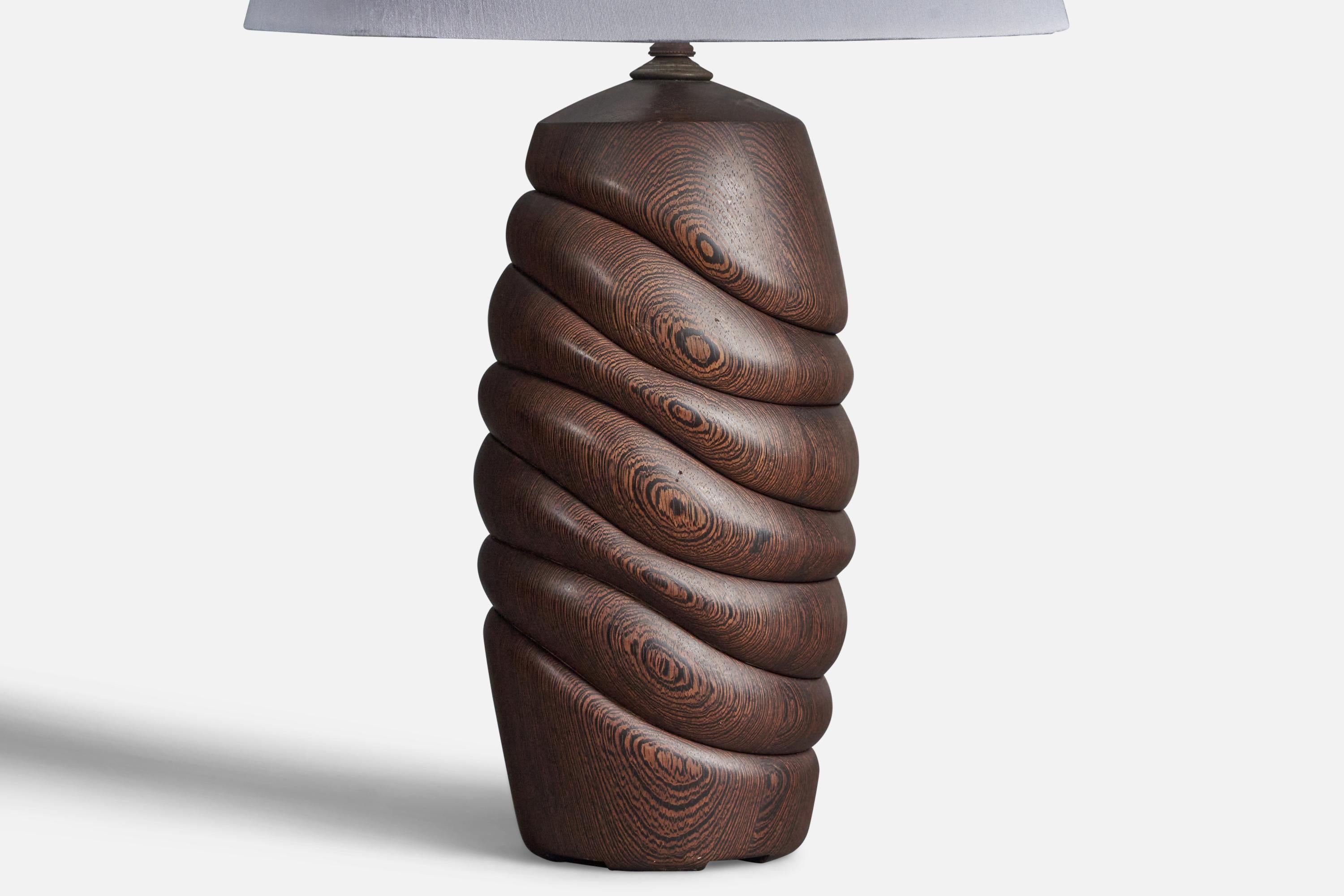An organic table lamp. Designed and produced in solid Wenge. Signed and dated 1980. Sold without lampshade.

Other designers of the period include Yasha Heifets, Isamu Noguchi, George Nakashima, Vladimir Kagan, and Edward Wormley.
