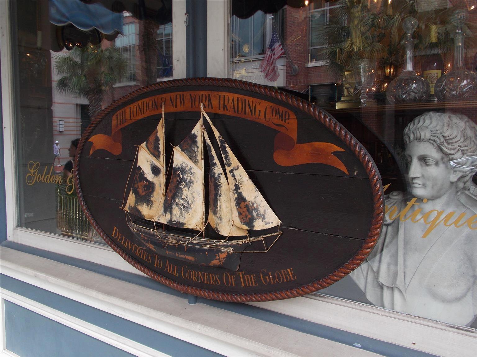 American Empire American Oval Timber Trade Sign with Two Masted Ship and Rope Boarder. C. 1850 For Sale