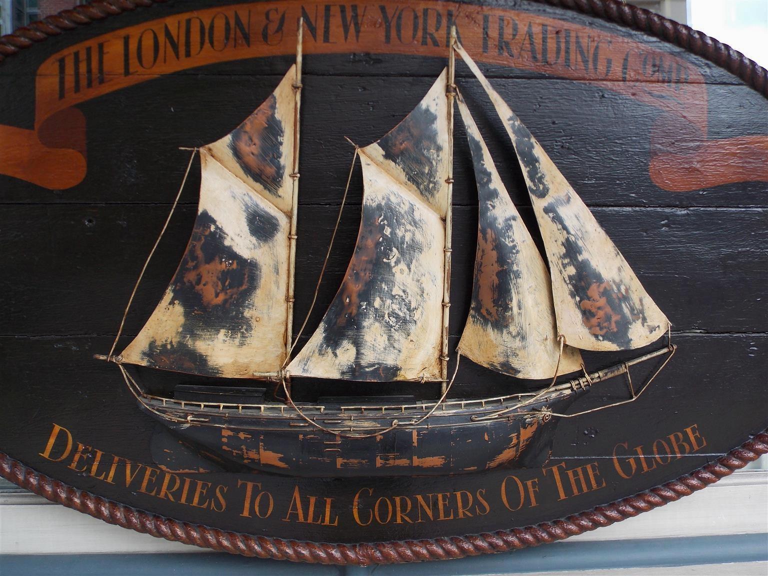 Mid-19th Century American Oval Timber Trade Sign with Two Masted Ship and Rope Boarder. C. 1850 For Sale