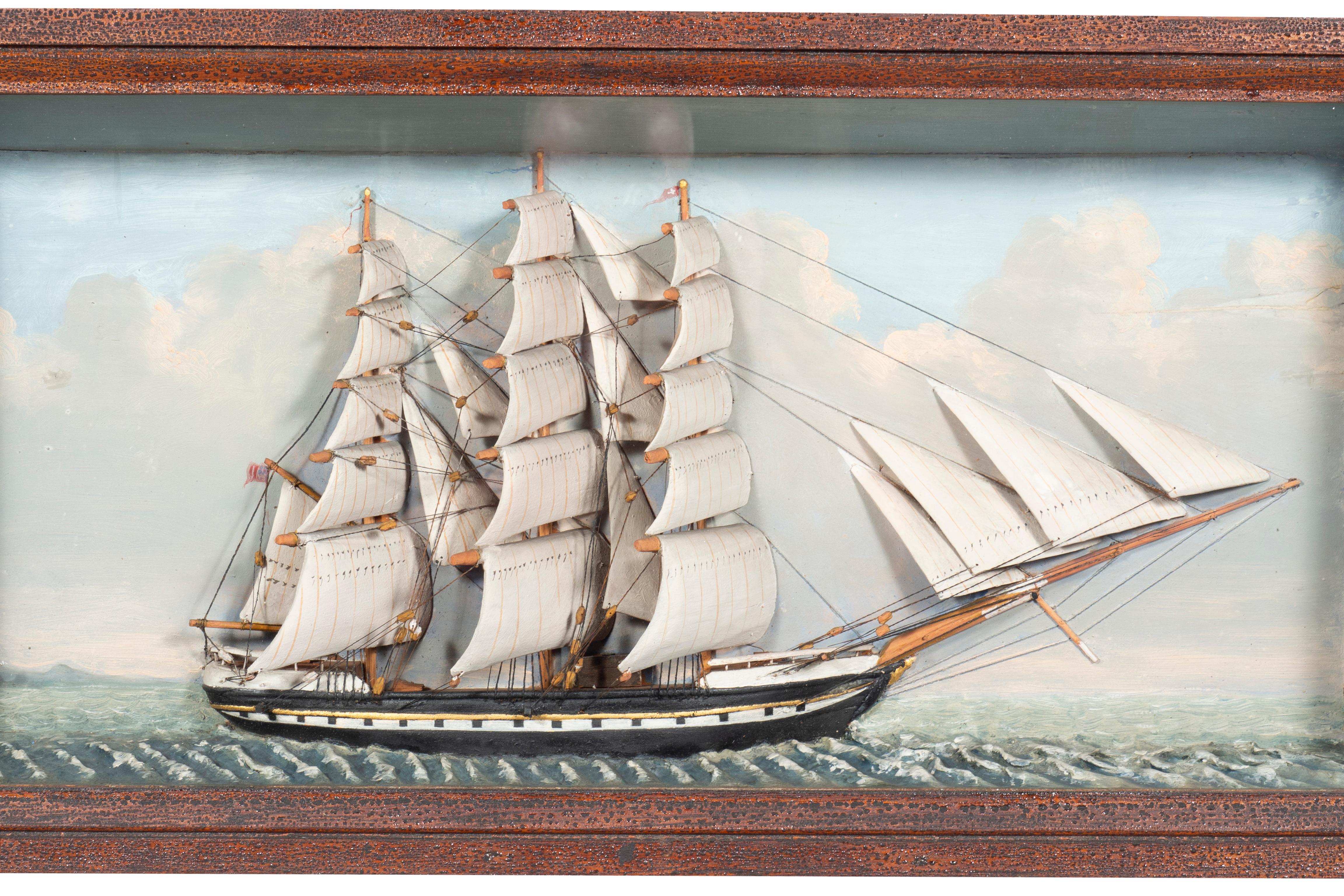 A good size and well painted with a large clipper ship. Dioramas are 1/2 models set in a seascape in a glass fronted case.