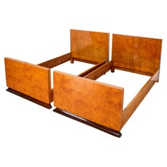 American Pair of Art Deco Burlwood Twin Bed Frames on Mahogany Plinths, c. 1930s