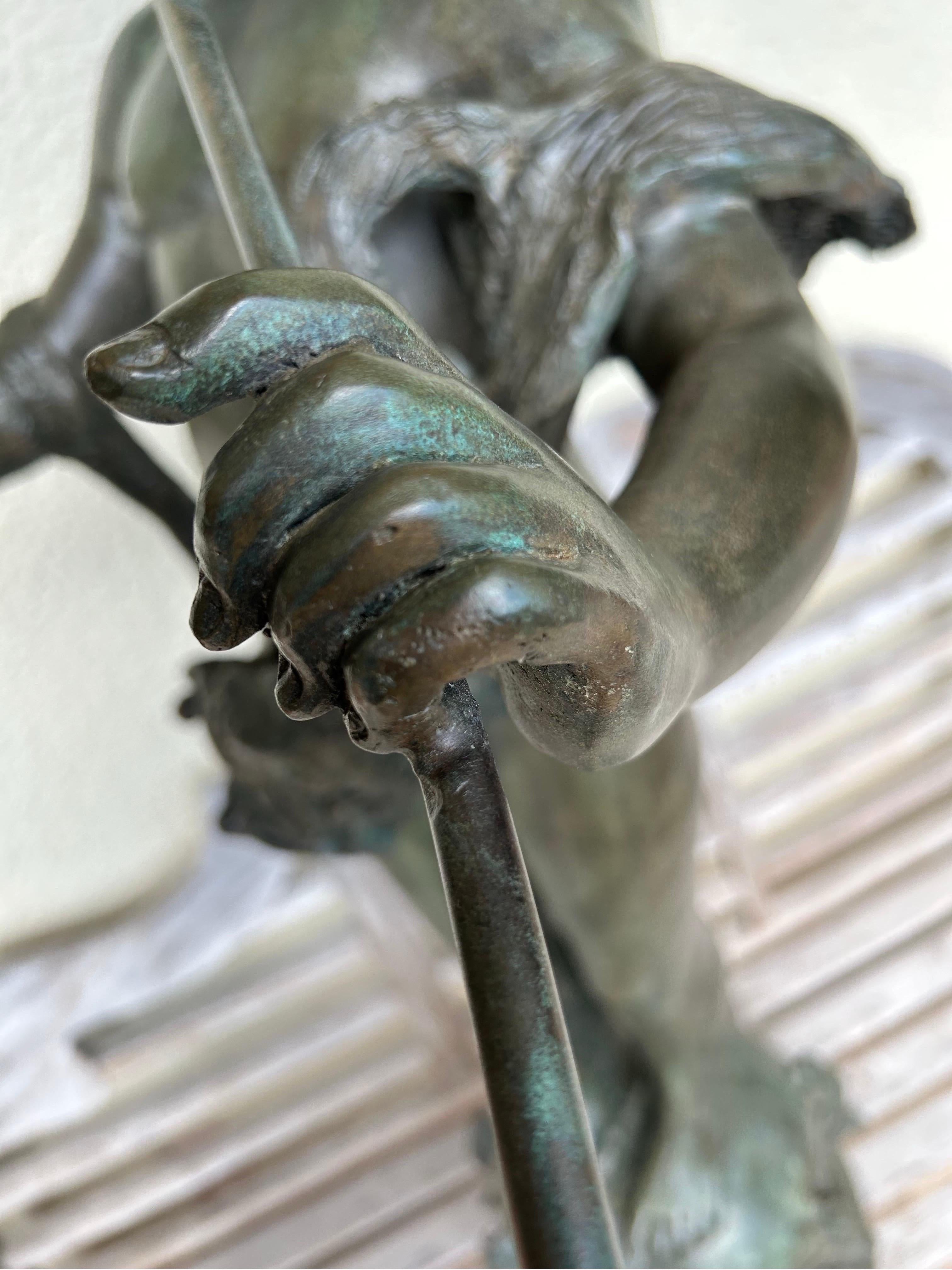 American pan of Rohallion bronze fountain with a boy playing pipes, standing on a globe with nine fish spouts… The boy’s head is topped with the head of a lion skin.. and a lion skin wrapping around his body .. all in beautifully patinated bronze..