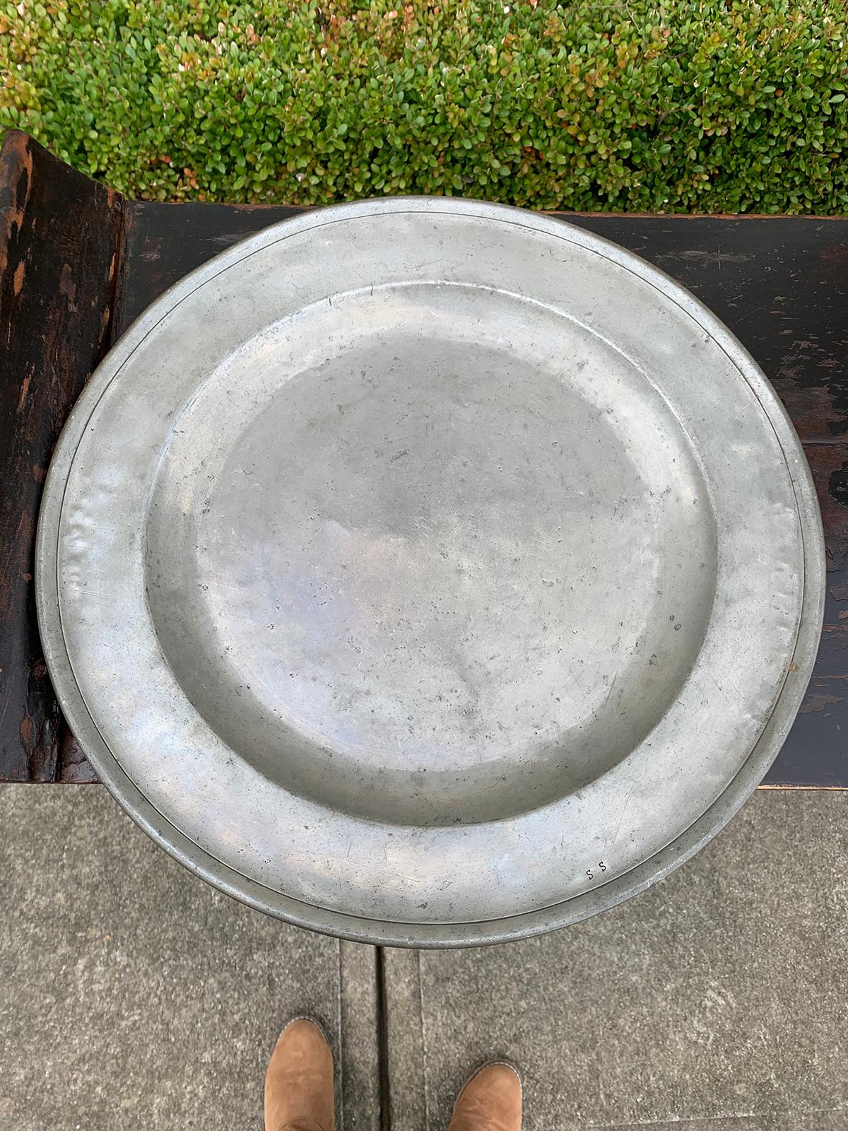 American Pewter charger, circa 1760-1840, marked SS.
