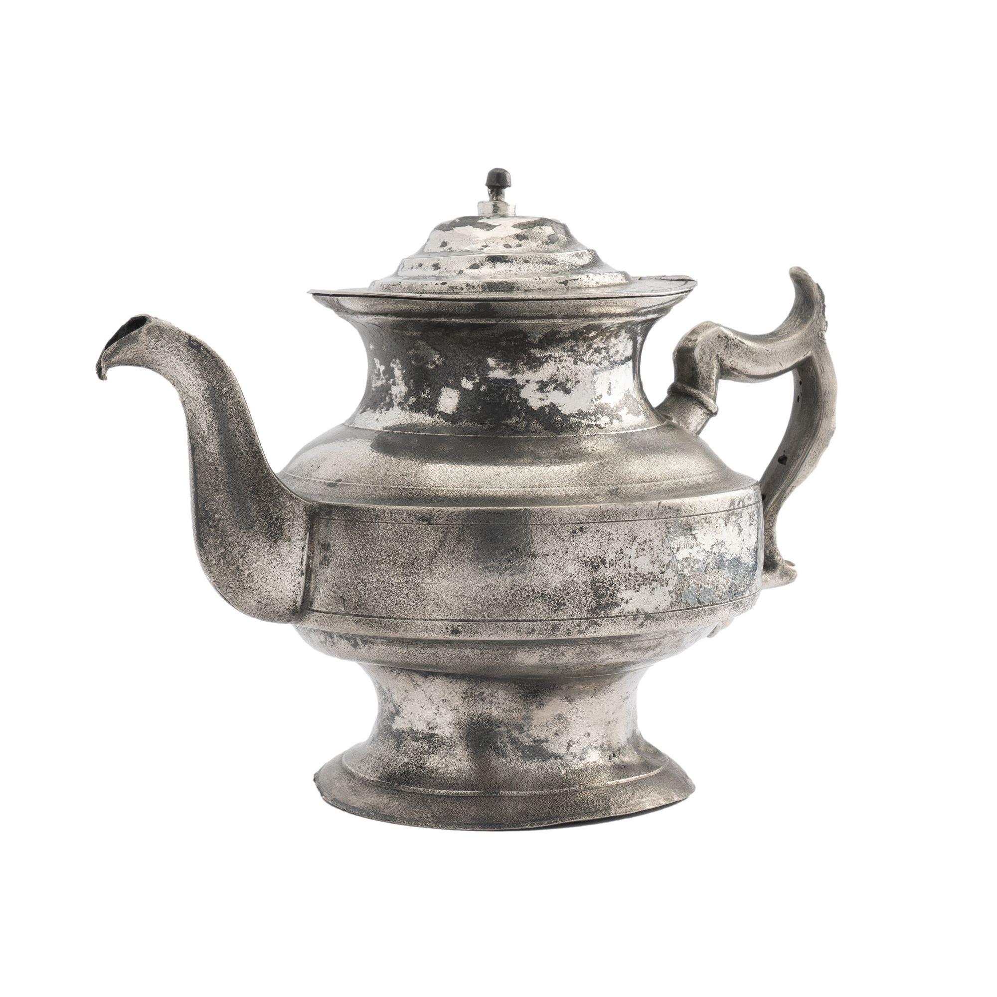 American pewter tea pot with a distressed exterior finish.
Meridan, Connecticut, circa 1820.