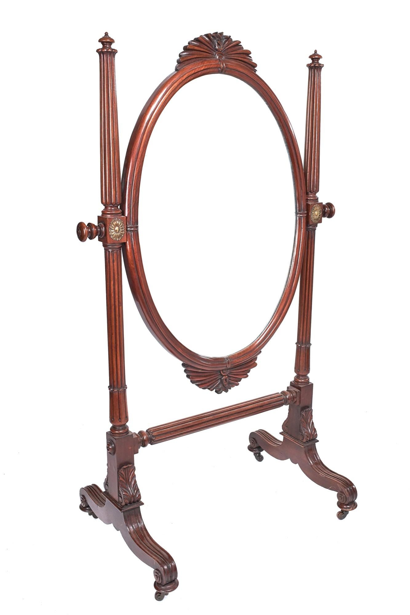 American Philadelphia Empire mahogany cheval mirror, circa 1825.
Certainly has the quality of top Philadelphia cabinet maker.
The oval mirror with ribbon moulding on front of frame,
fan carving on top and bottom of mirror frame,
mirror sitting