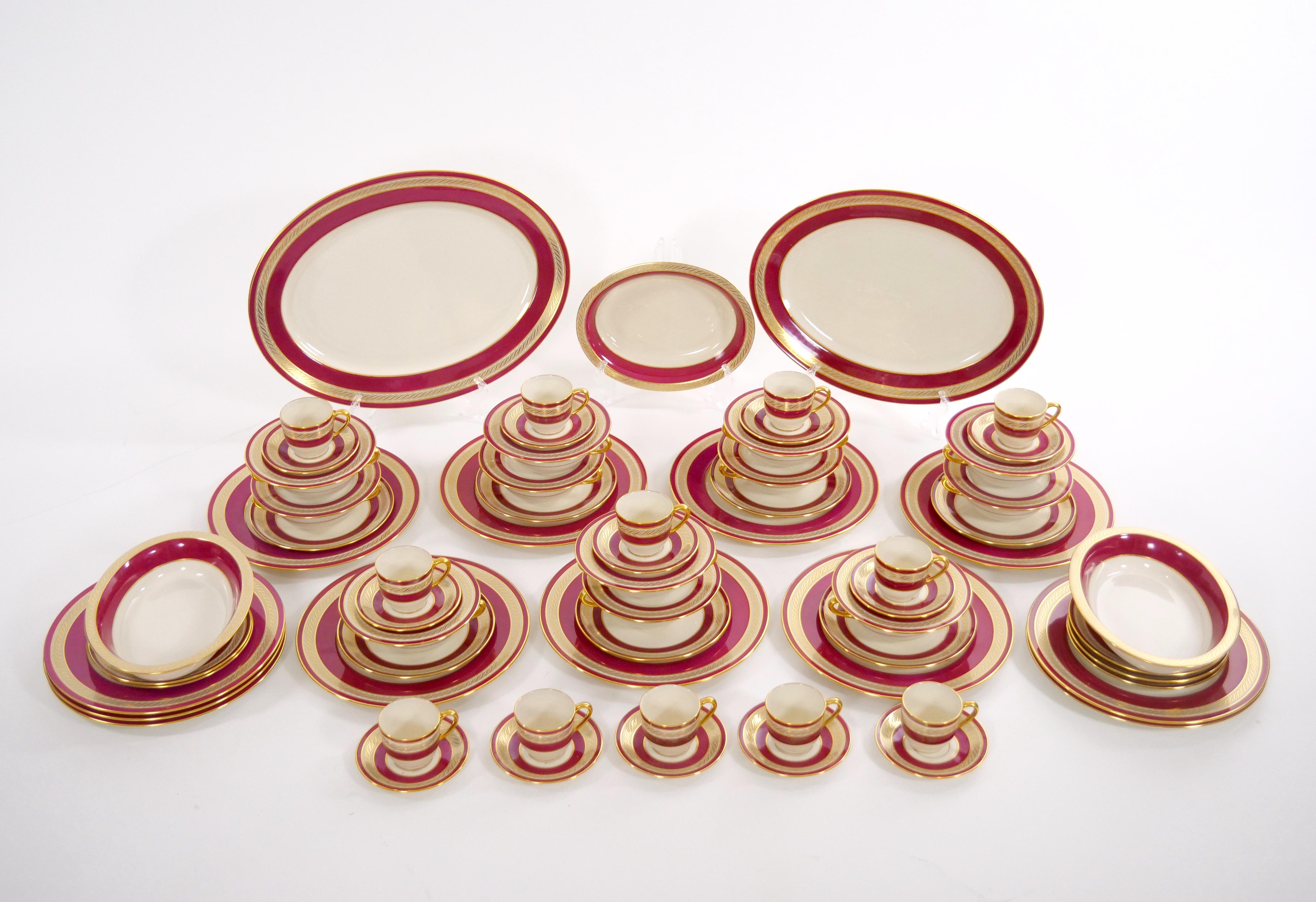 Elevate your dining experience with this exquisite American Porcelain/Gilt Braid Dinnerware Service, crafted by Lenox for J.E. Caldwell & Co. This stunning set includes everything you need to entertain in style, with service for 12 people. Each