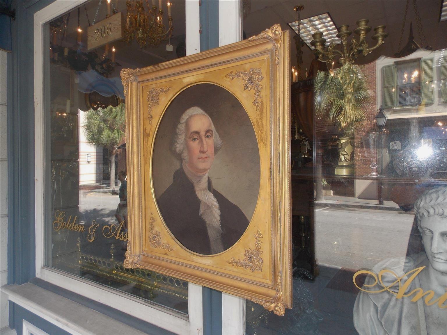 American oval portrait of George Washington oil on canvas in the original gilt floral frame and wood back, unsigned, Copied from the original painting by Gilbert Stuart. Early 19th century.