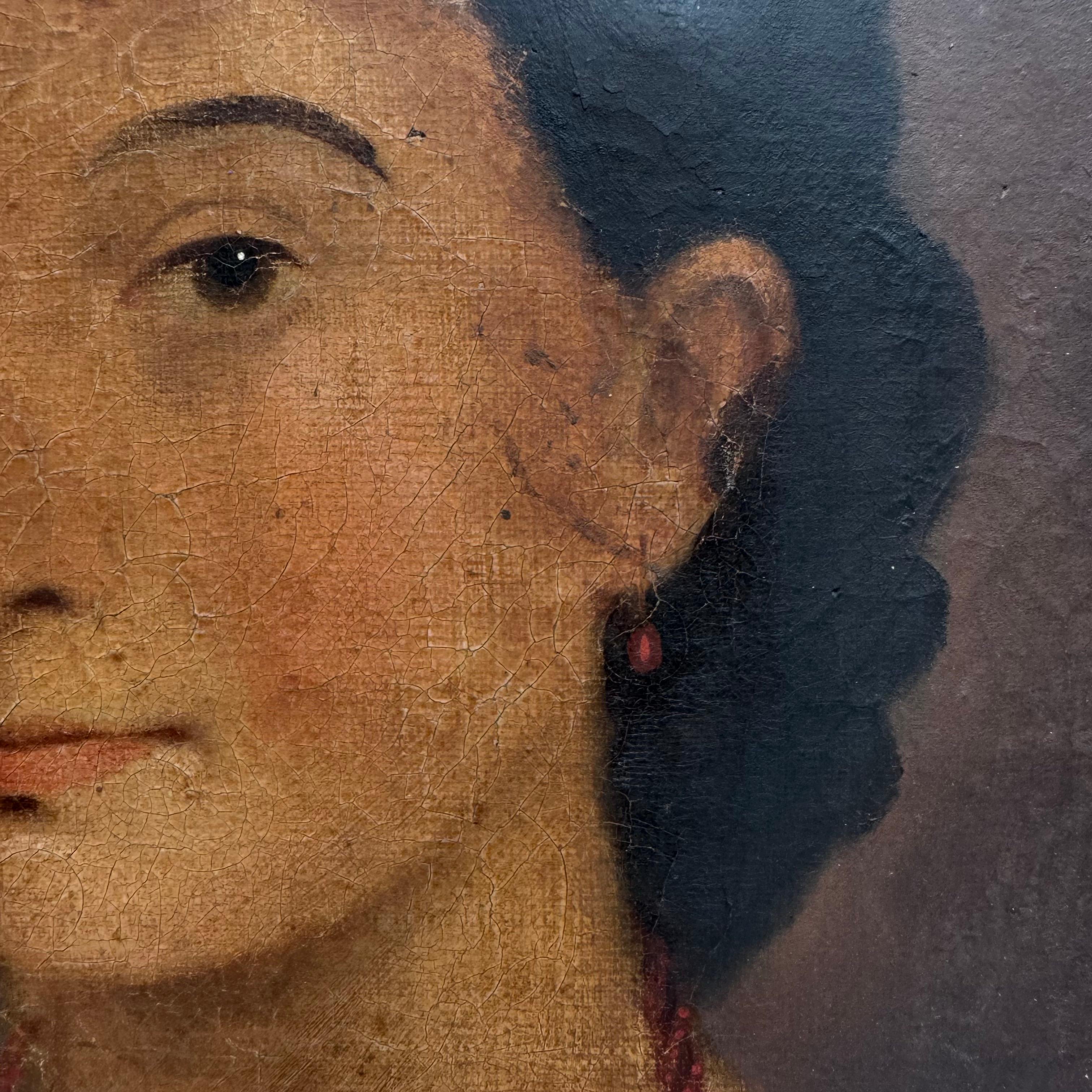 Oil on canvas portrait painting of a lady in wearing a red necklace in the original gilt frame
American 1879