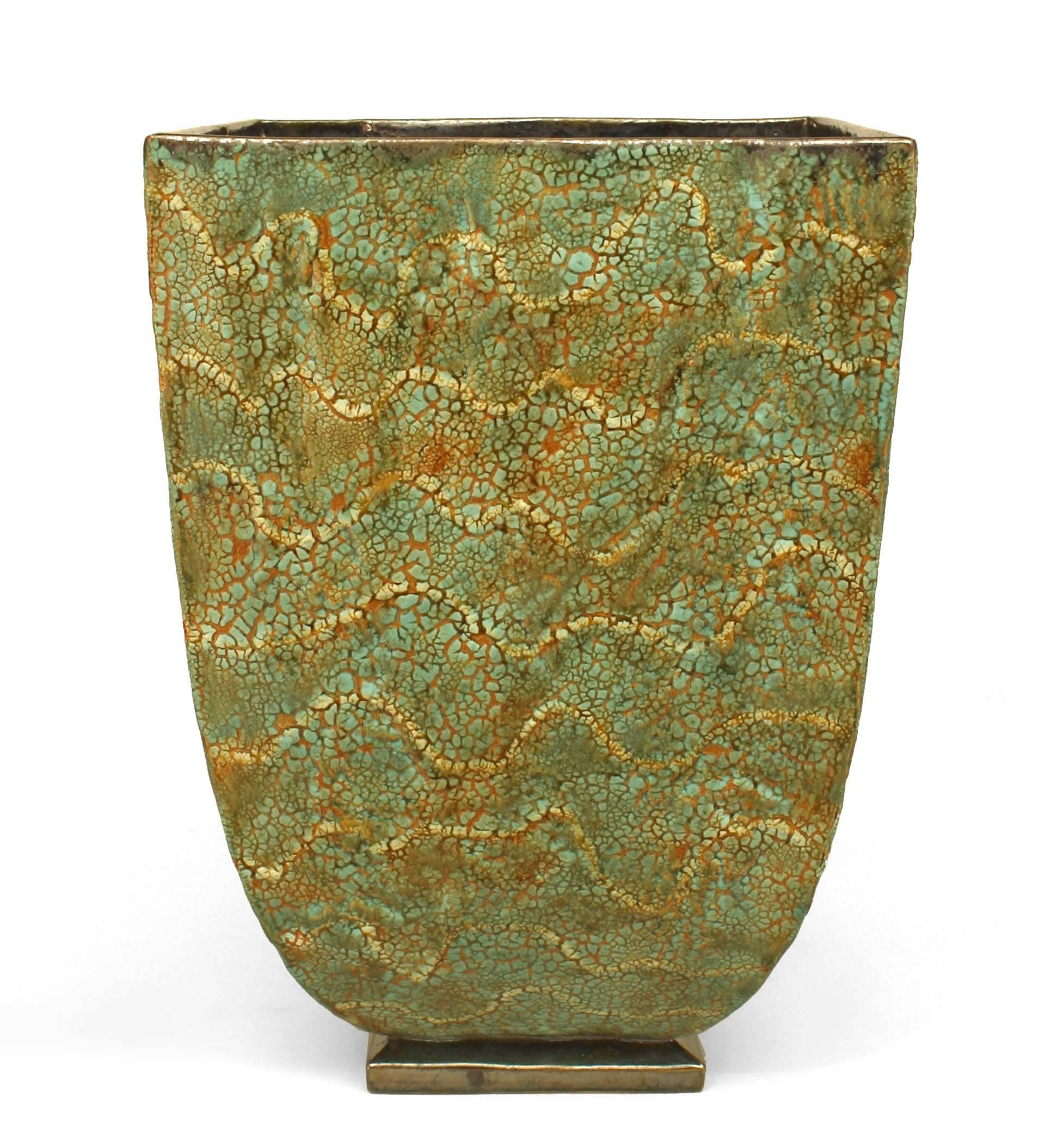 American post-war design large glazed ceramic green textured square tapered jardiniere resting a low square base designed by acclaimed and collectible artist Gary DiPasquale.
 