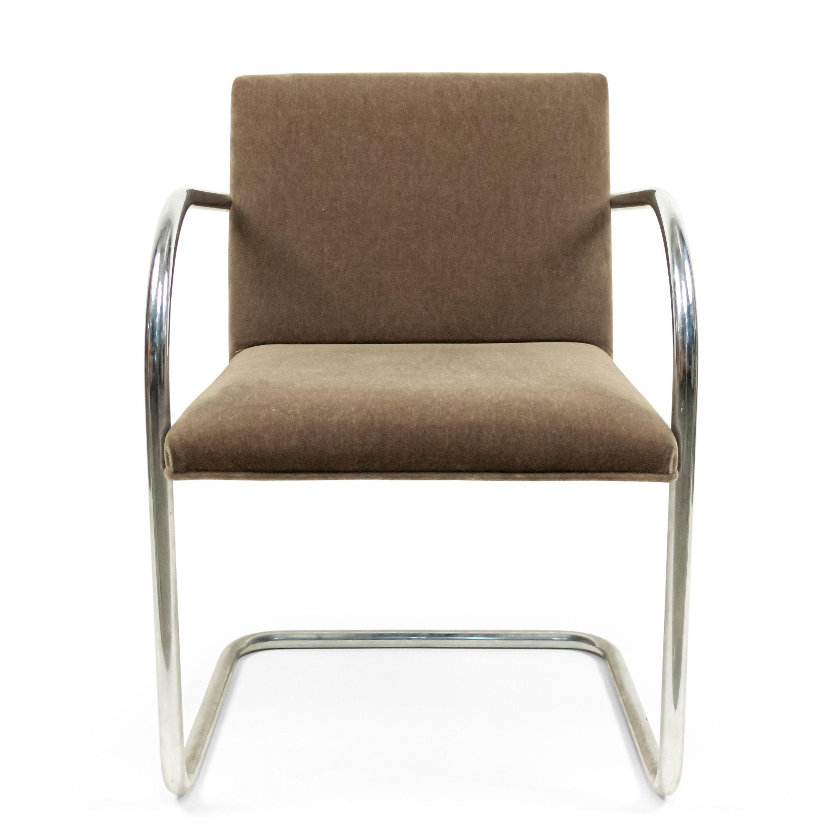 3 American post-war design chrome framed armchairs with various shades of grey upholstered seats with a square back (style of Mies van de Rohe-Gordon Chair Co) (priced each).