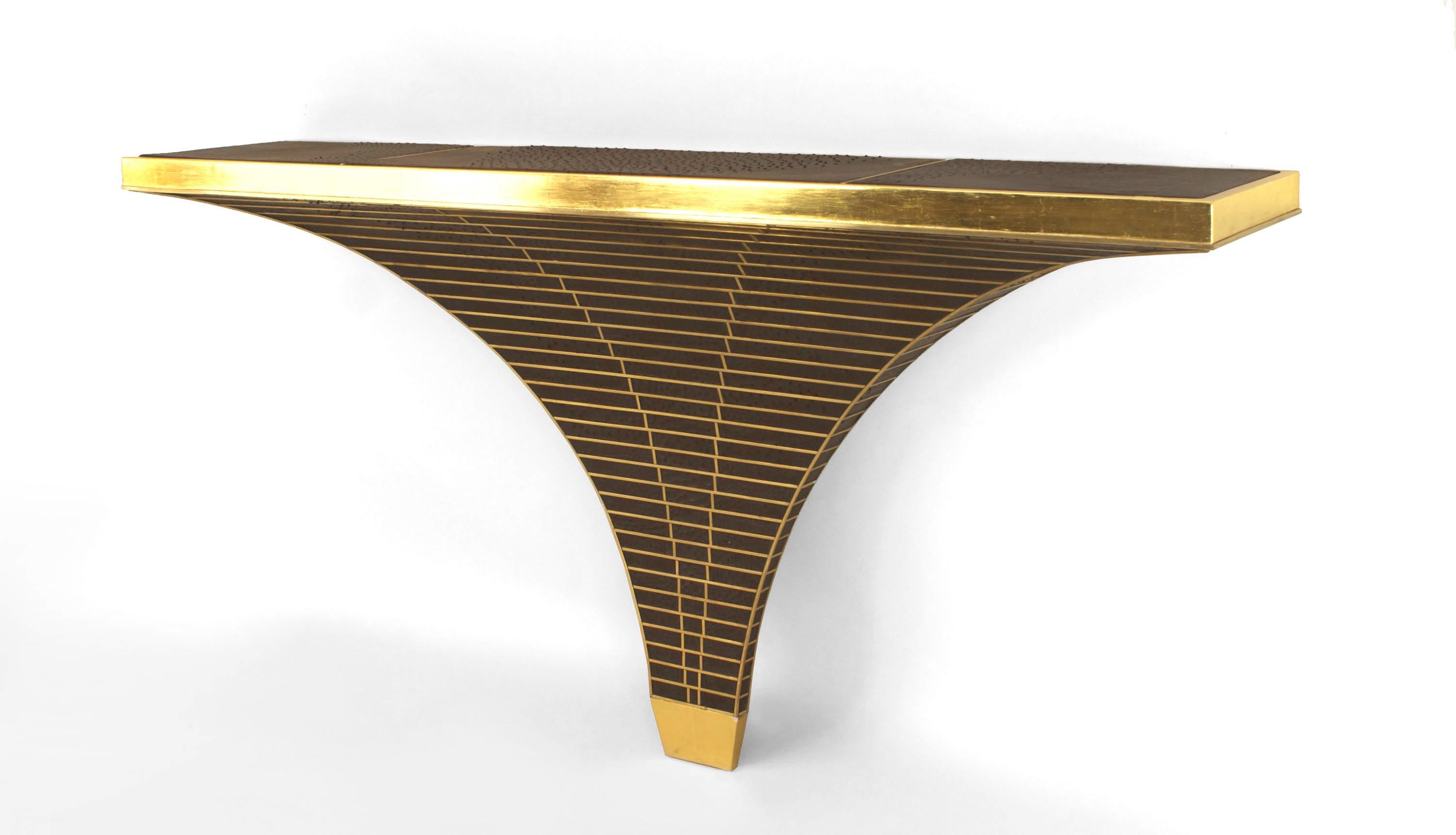 American postwar design ‘modern’ brass trimmed console table with swooping triangular form base ending in a giltwood foot with ostrich upholstered top and base. Limited edition of 5.
    
