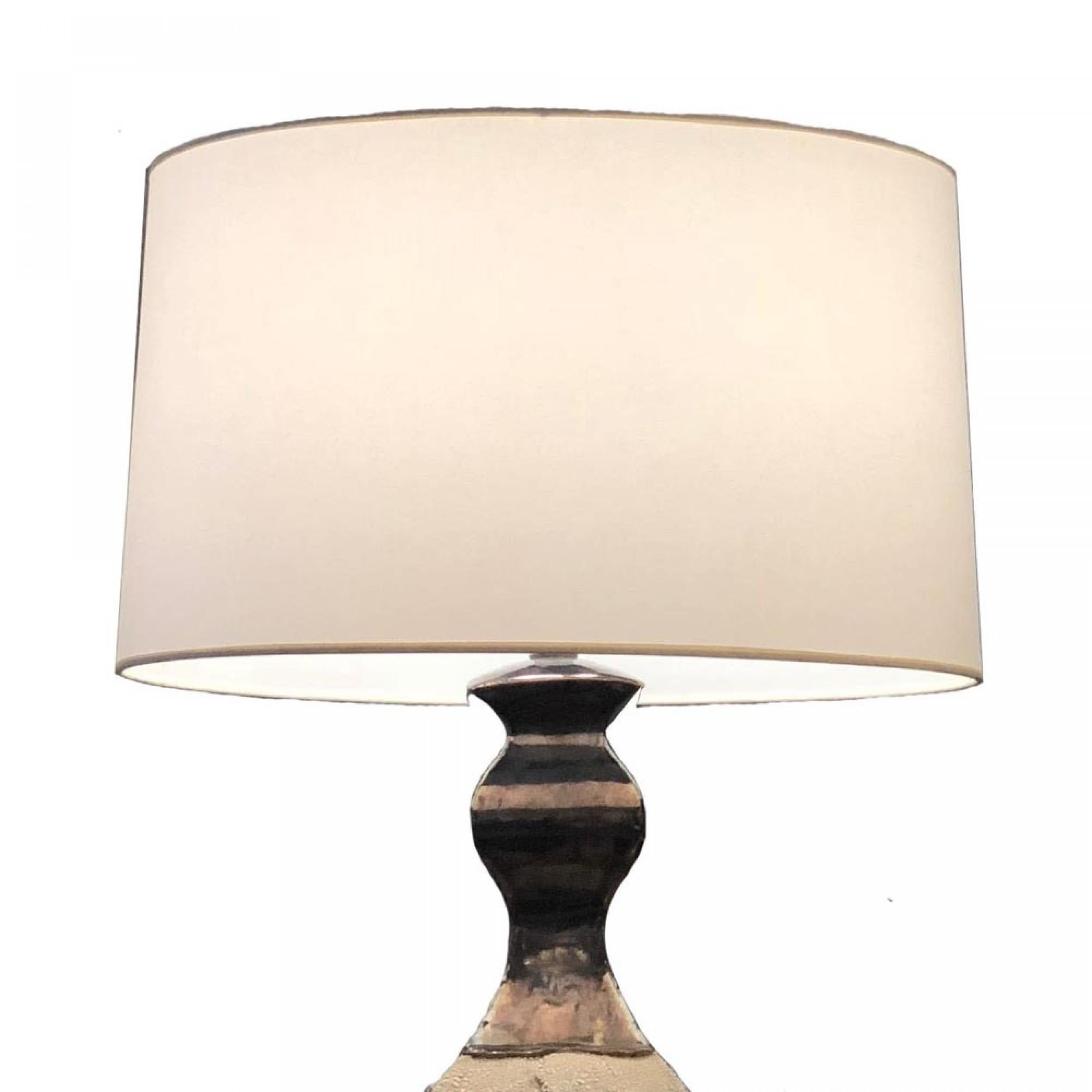 American postwar design grey and white textured bulbous square base table lamp with a glazed tapered and flared neck designed by acclaimed and collectible artist Gary DiPasquale.
   