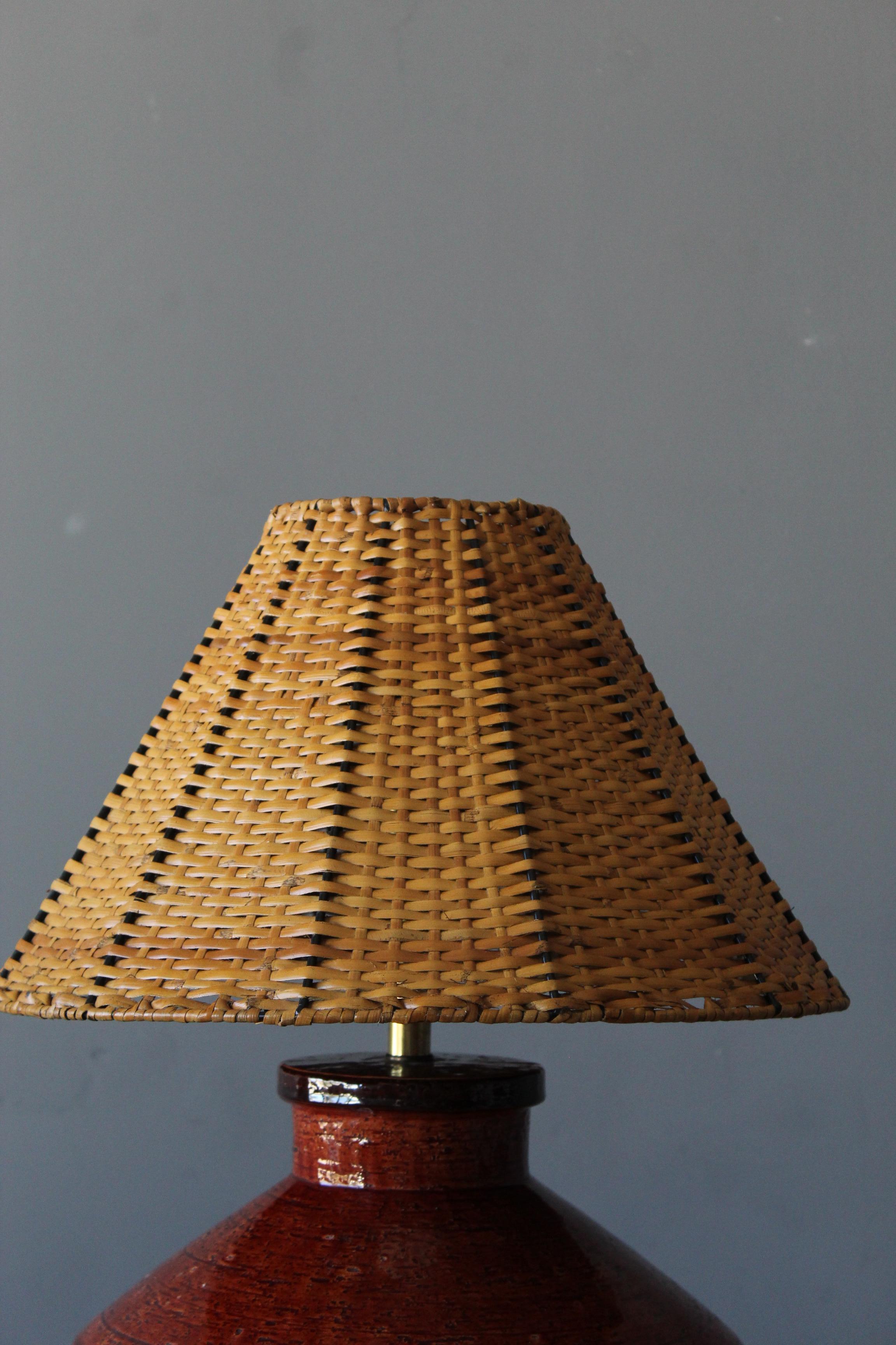Mid-Century Modern American Potter, Table Lamp, Red Glazed Ceramic, Rattan, United States, 1950s