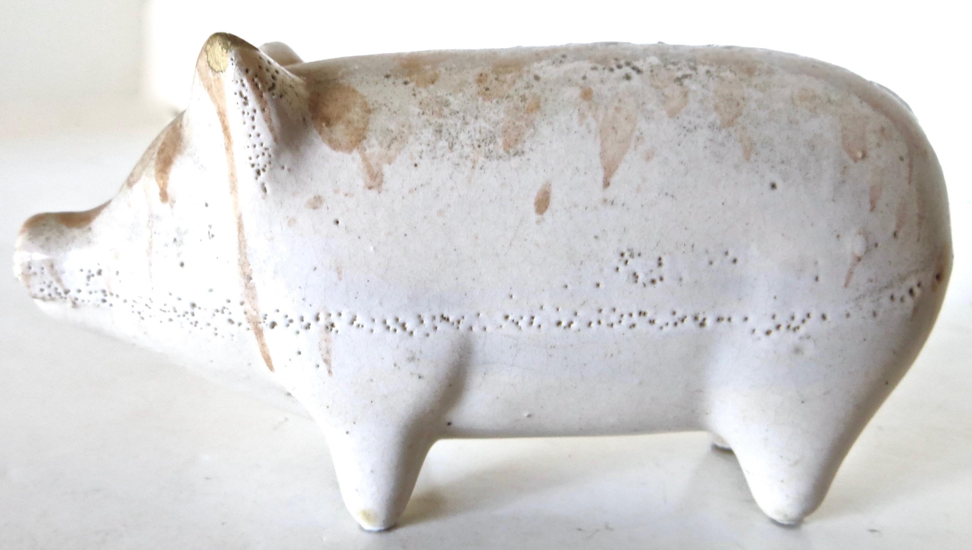 American pottery still bank in the shape of a pig, used for saving coins (usually pennies) to encourage children the importance of thrift. Pottery still banks are somewhat scarce since the typical way to remove coins was to smash the bank open,