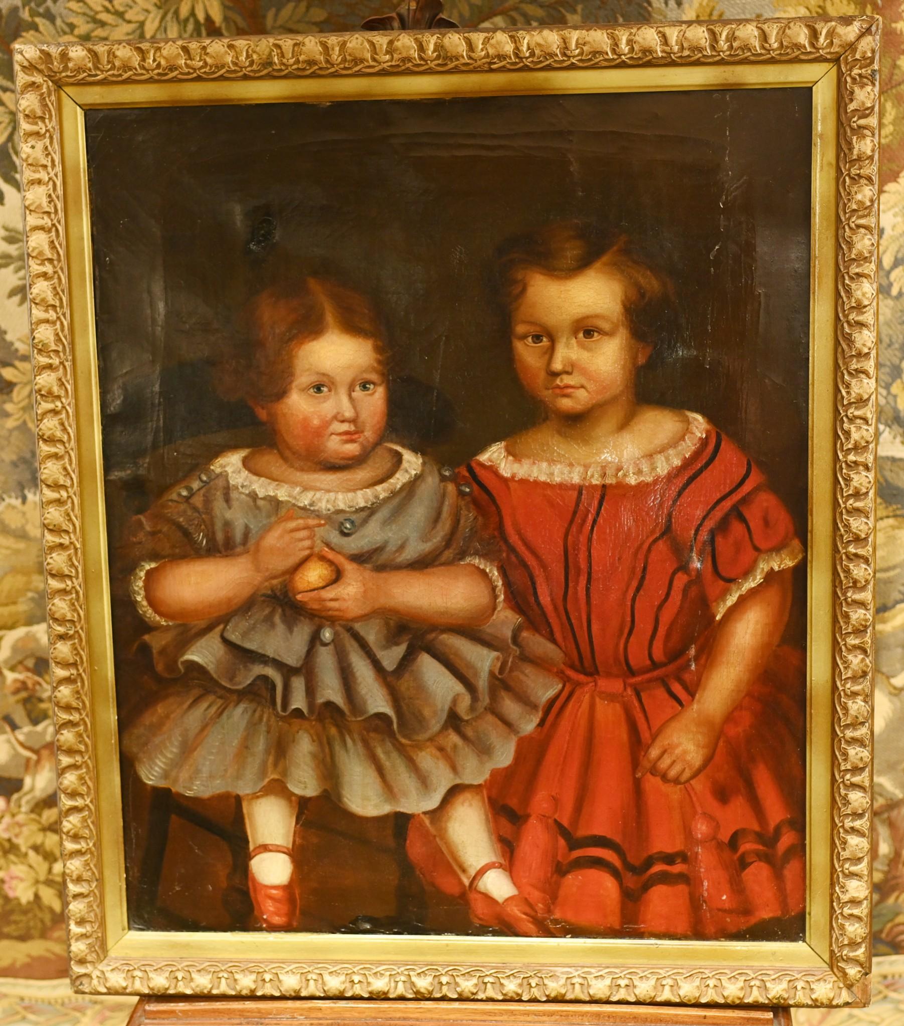 You are viewing a gorgeous American primitive oil painting of two girls
This quirky portrait is a wonderful piece of folk art
Circa 1840
Wonderful effect of craquelure from the age of the painting which adds value and character
Comes in the gilt
