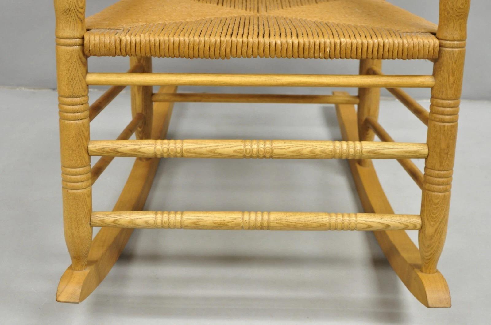 American Primitive Rustic Oak Wood Rush Seat Rocking Chair by Cracker Barrel For Sale 1