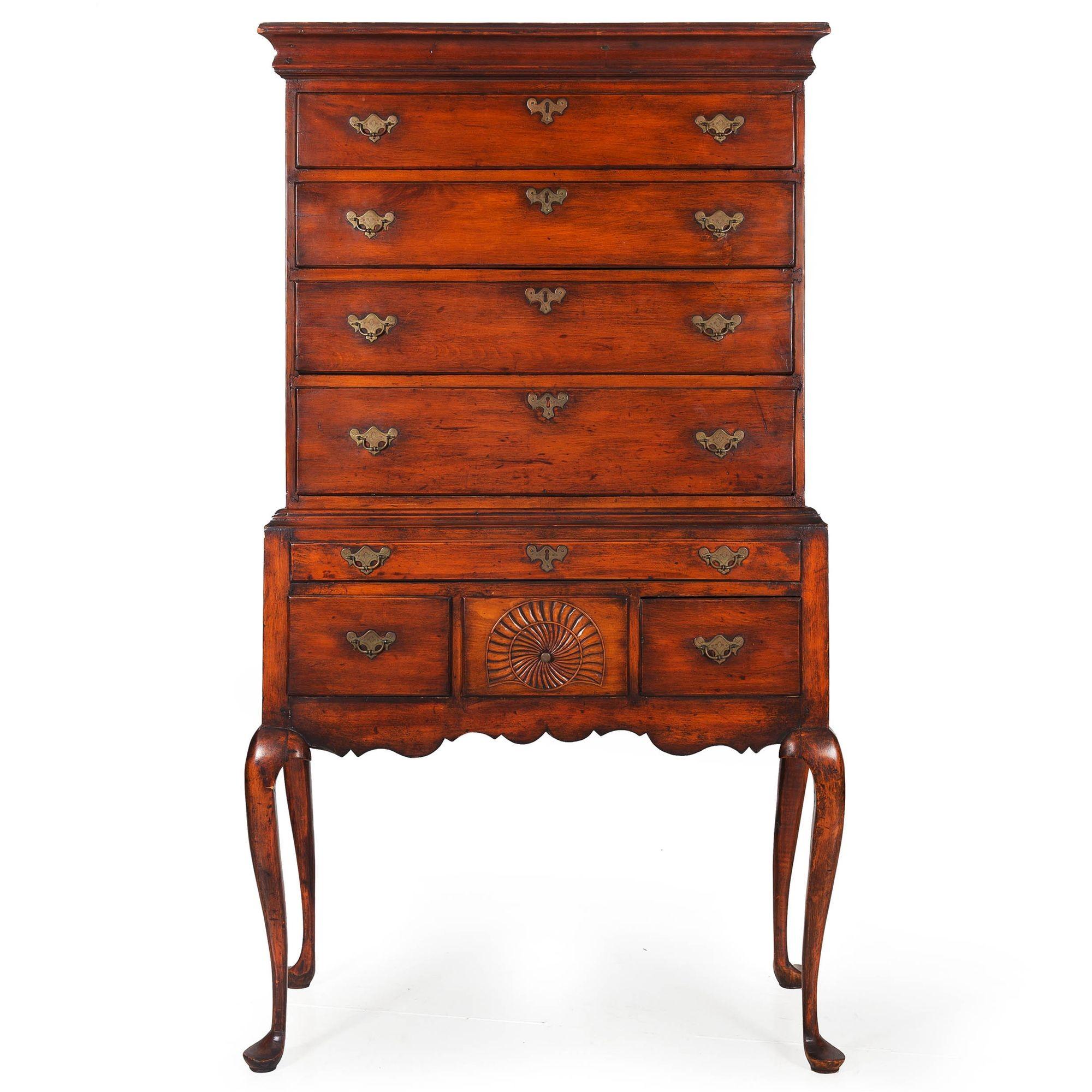 QUEEN ANNE CARVED AND FIGURED SYCAMORE FLAT-TOP HIGHBOY
New England States, circa 1760-1780  formerly with Sotheby's in 2003
Item # 209MPN16S 

A very fine flat-top highboy executed in beautifully figured and patinated sycamore, it features a bold