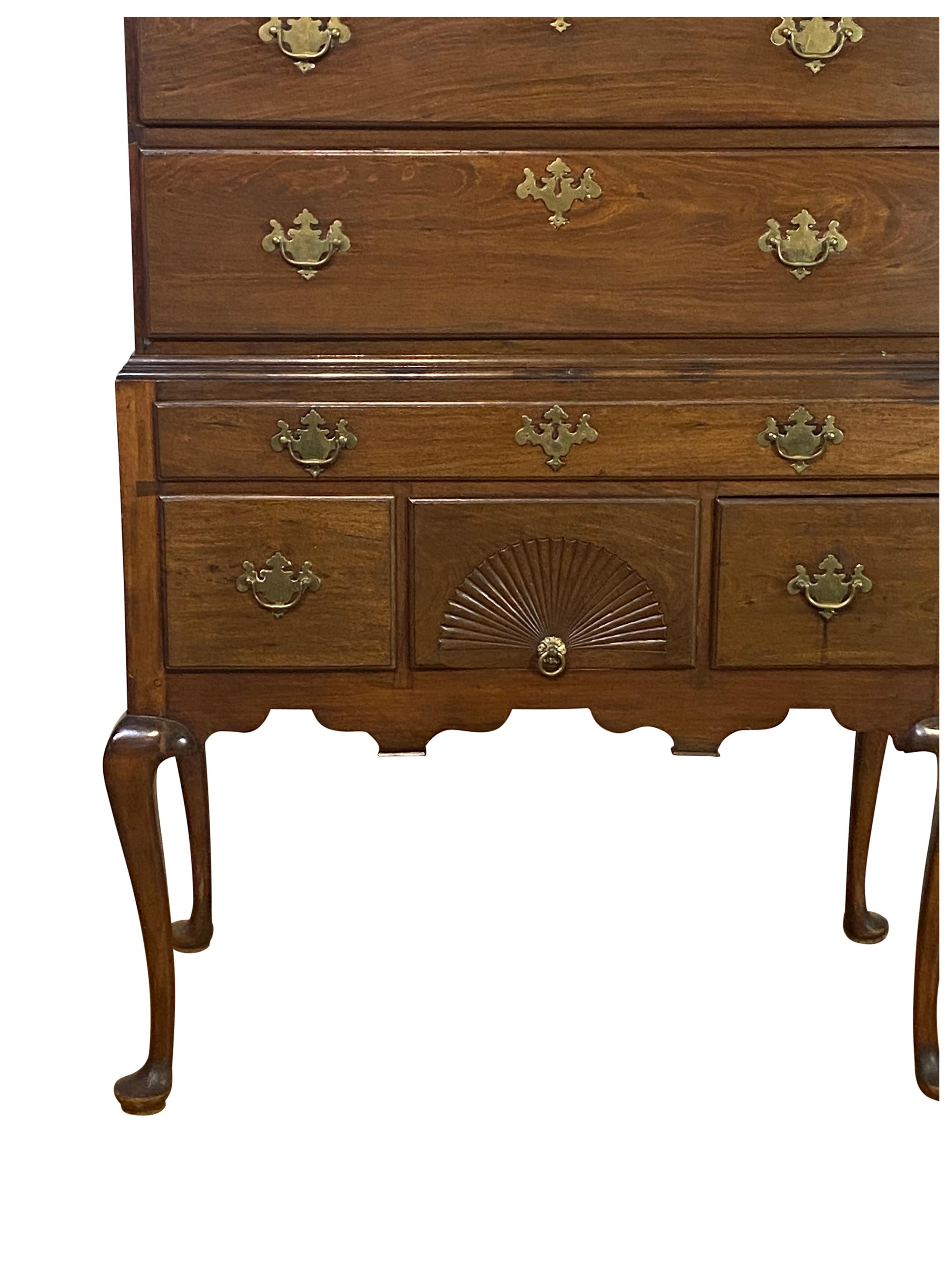New England highboy with fan set in skirt, elegant proportions. I have no tolerance for a mediocre high chest, the legs are original and seem to be birch (New England frugality-sides are also birch. This is a first rate highboy . Ask for a full
