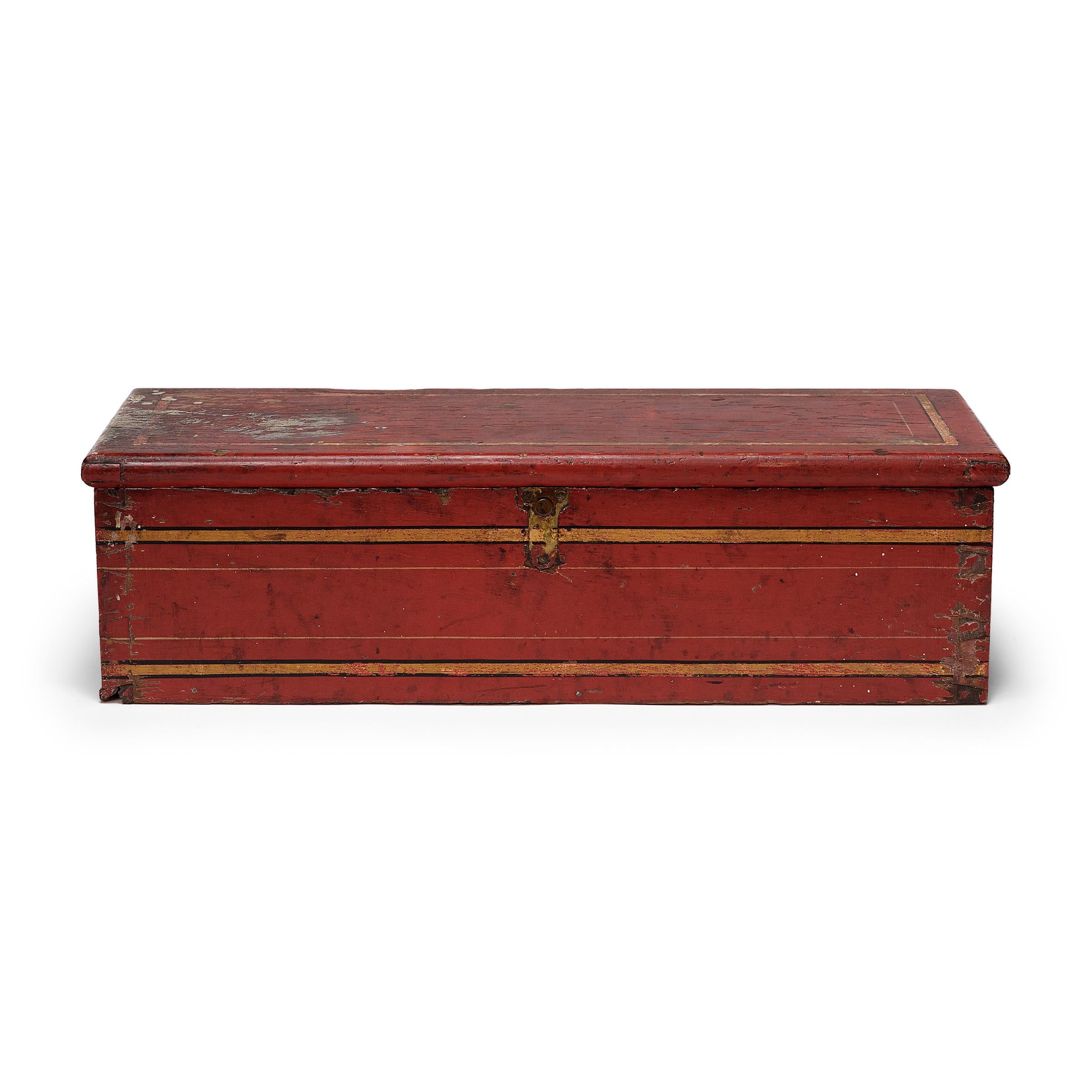 This charming painted chest is a wooden toolbox originally used to store spare nozzles and various tools on a turn-of-the-century American fire hose reel. While some fire hoses of this era were affixed to large, horse-drawn wagons, others were