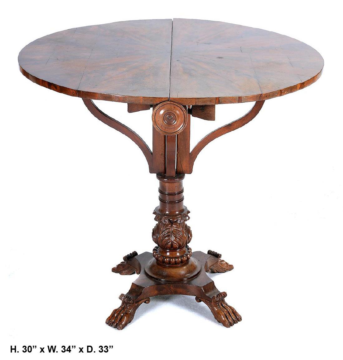 Beautiful unique 19th century American mahogany butterfly pedestal table.
The mahogany veneered round top cut to fold as a butterfly resting on pedestal over stretcher with four animal feet.
Measures: H 30