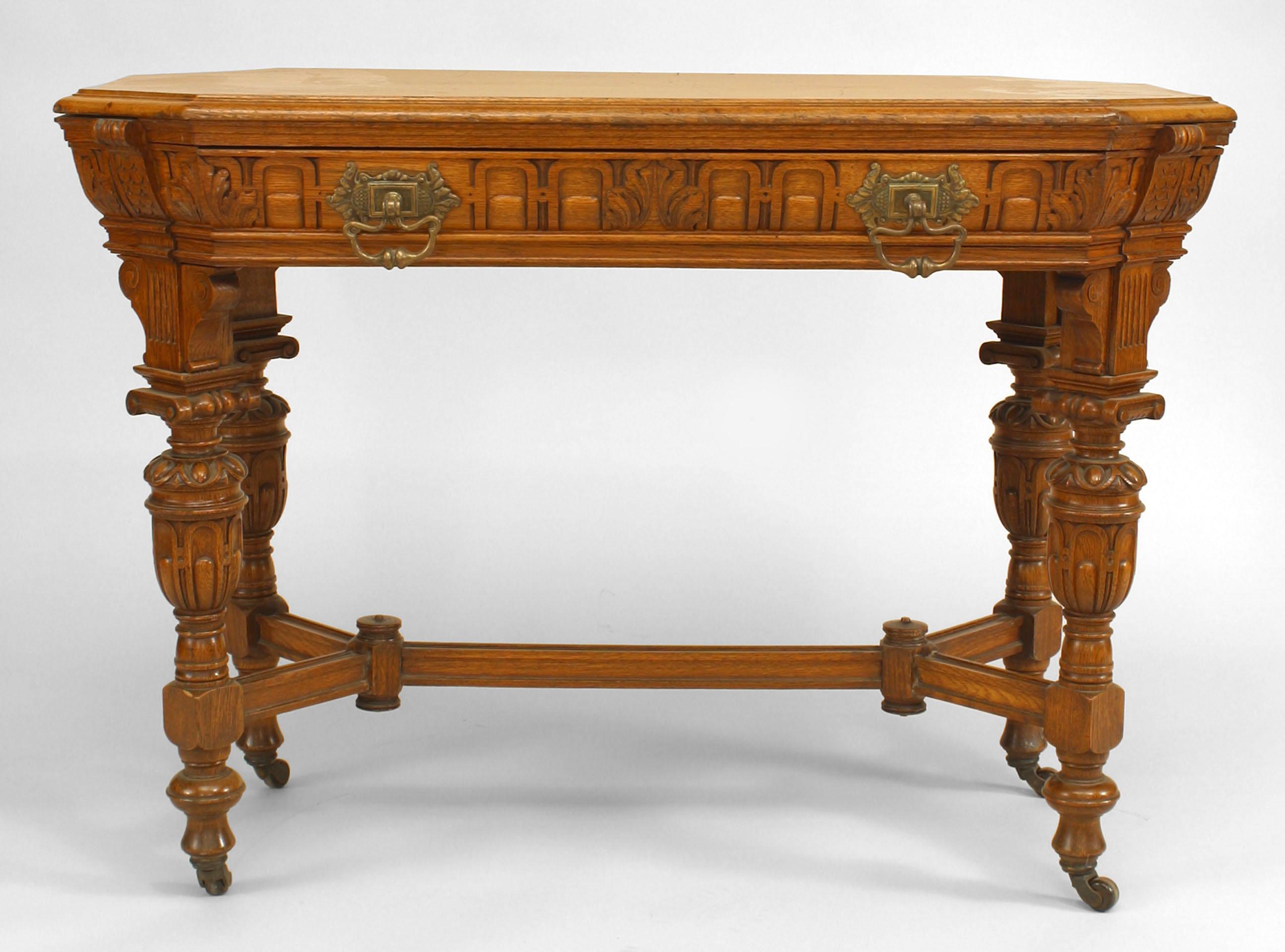 American Renaissance Revival Victorian golden oak end table with stretcher and drawer and 6 sided rectangular shaped top.
