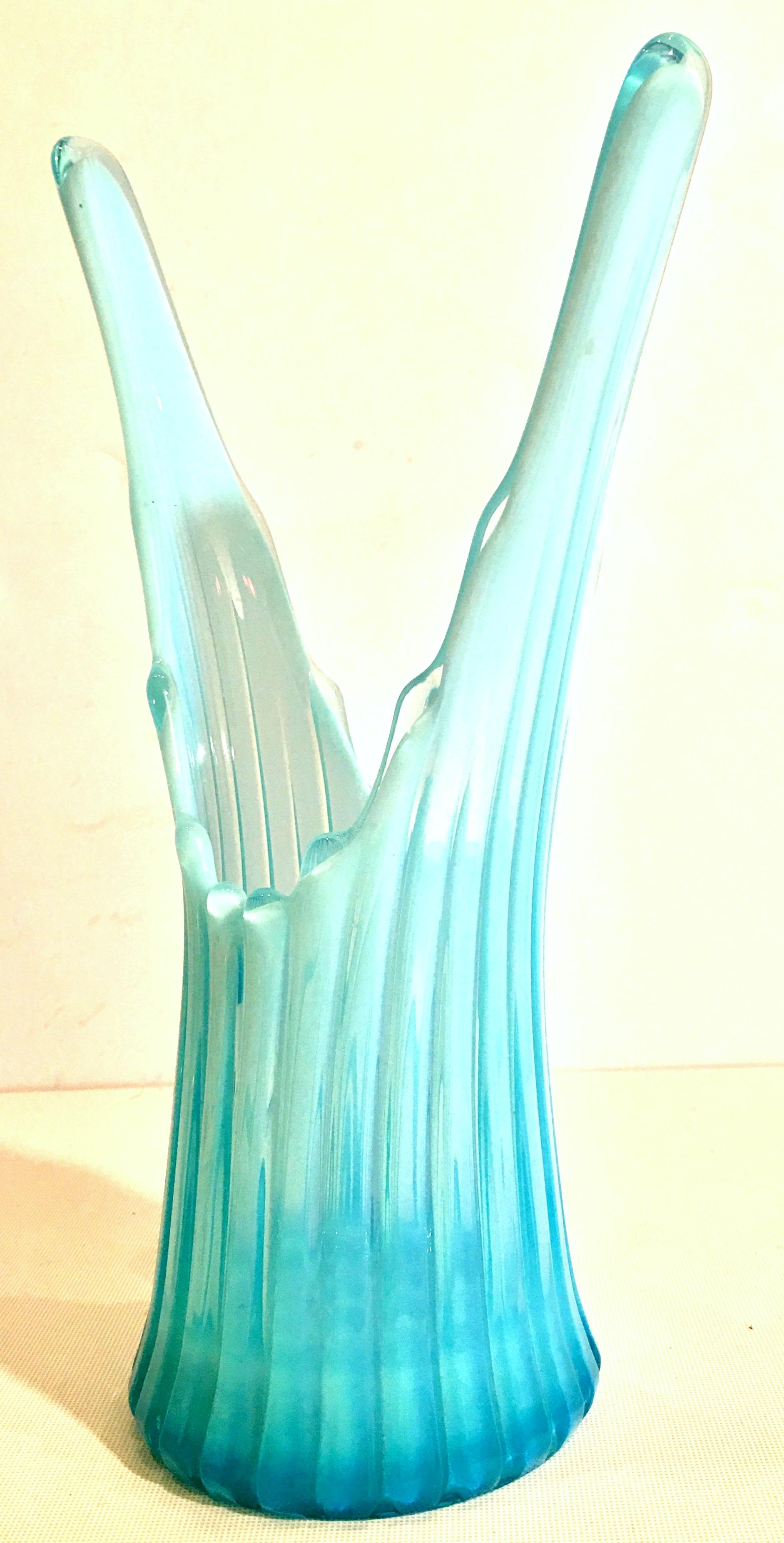 Mid-Century American slag glass vase in opalescent sky blue. Features a fluted body stile with cased white detail.