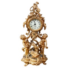 Reloj de chimenea dorado rococó americano Querubín