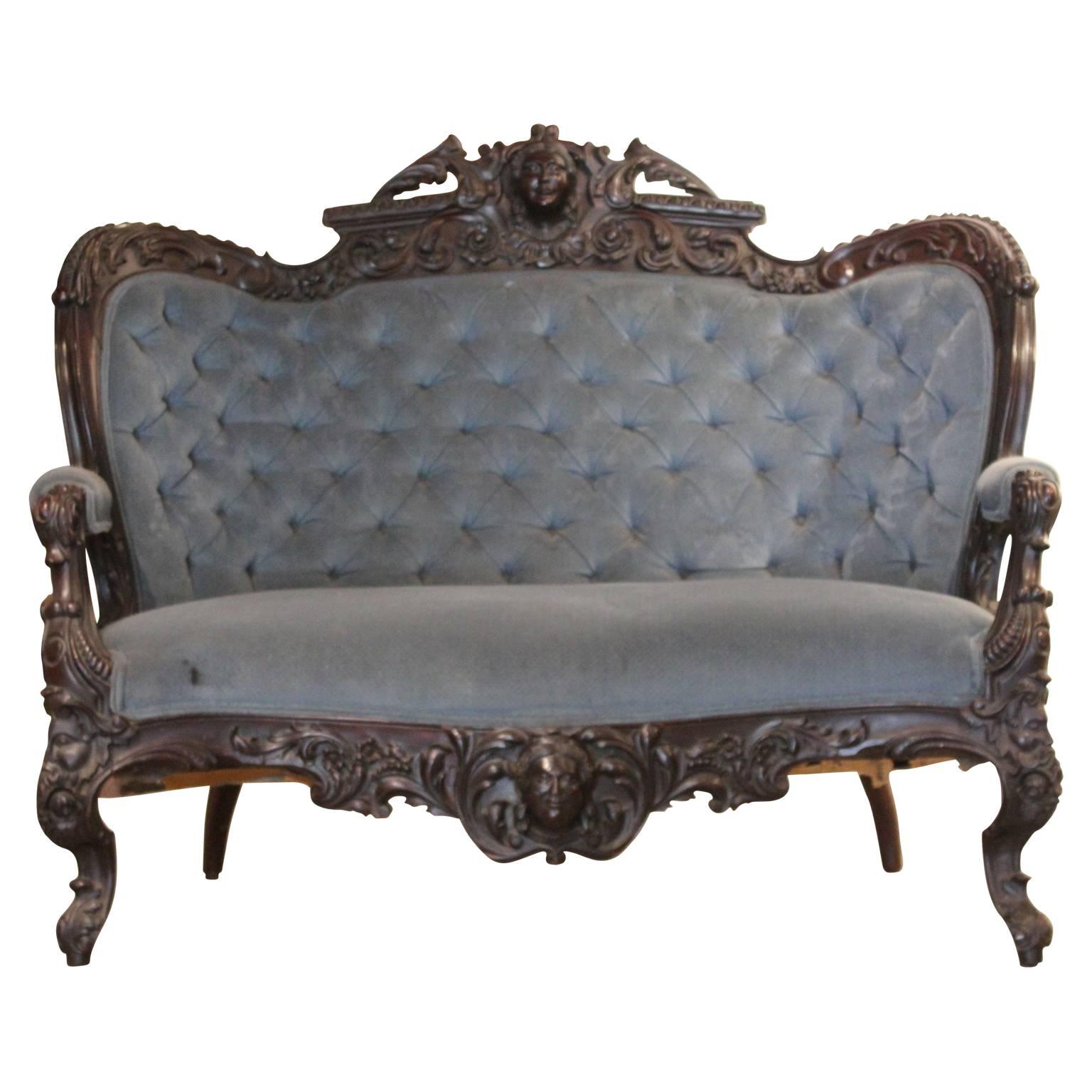 American Rococo Renaissance Revival four-piece parlour set made from mahogany. Consists of one loveseat and three side chairs. In original fabric. 

Dimensions:

Loveseat: 45 in. H x 54 in. W x 39 in. H x 18 in. SH
Side chairs: 43.5 in. H x 22