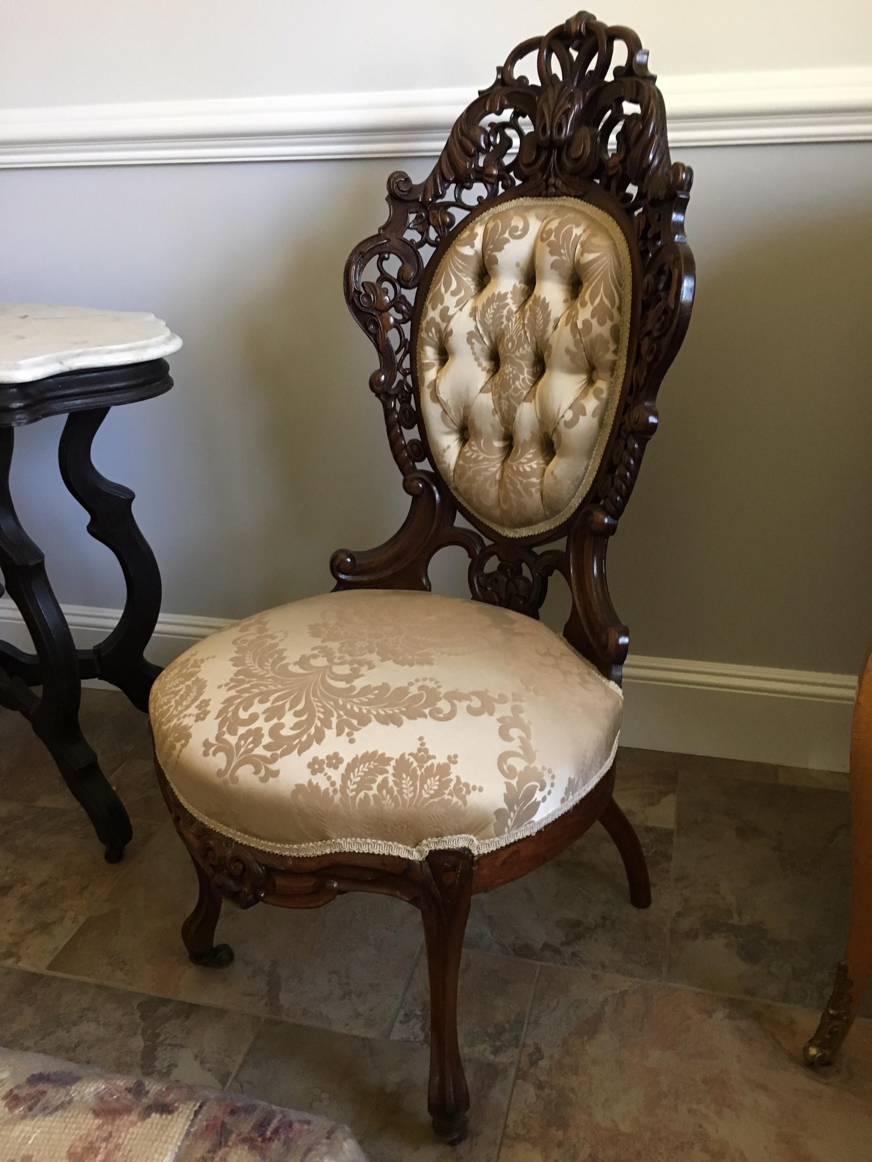 American Laminated Rosewood Rococo revival parlor chair, attributed to J & J.W. Meeks. Ornate pierce carved side chair with cabriole legs on casters attributed to New York City maker, J & J.W. Meeks. Though no stickers are present, the quality of