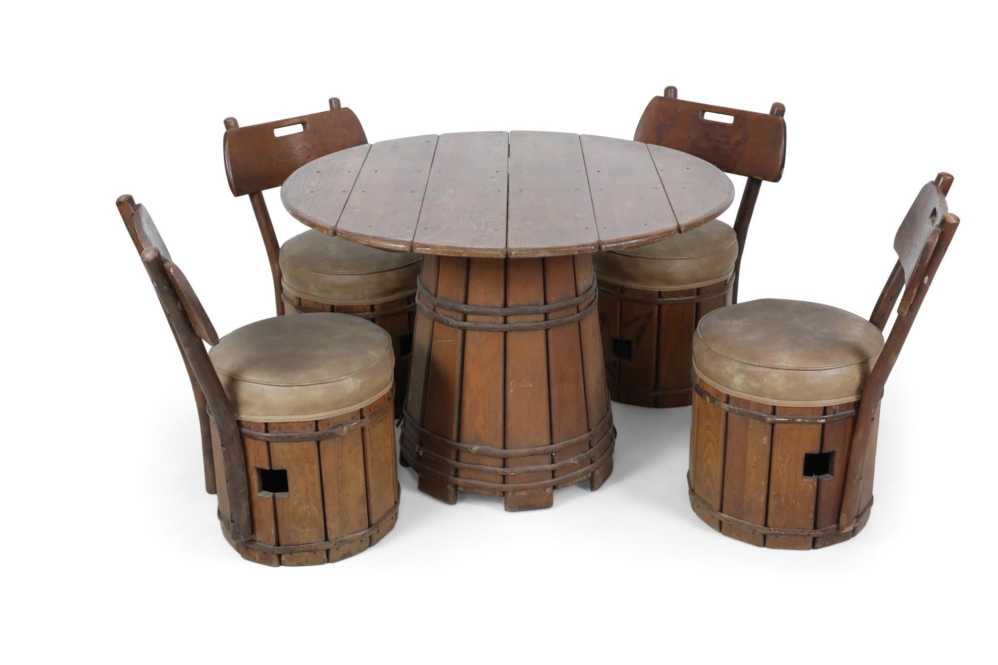 5 piece American rustic old hickory pub set composed of a round table with a slat barrel base and 4 matching side chairs with a slat barrel base and round vinyl upholstered seat. (Branded: OLD HICKORY, MARTINSVILLE, INDIANA).

Table dimensions: