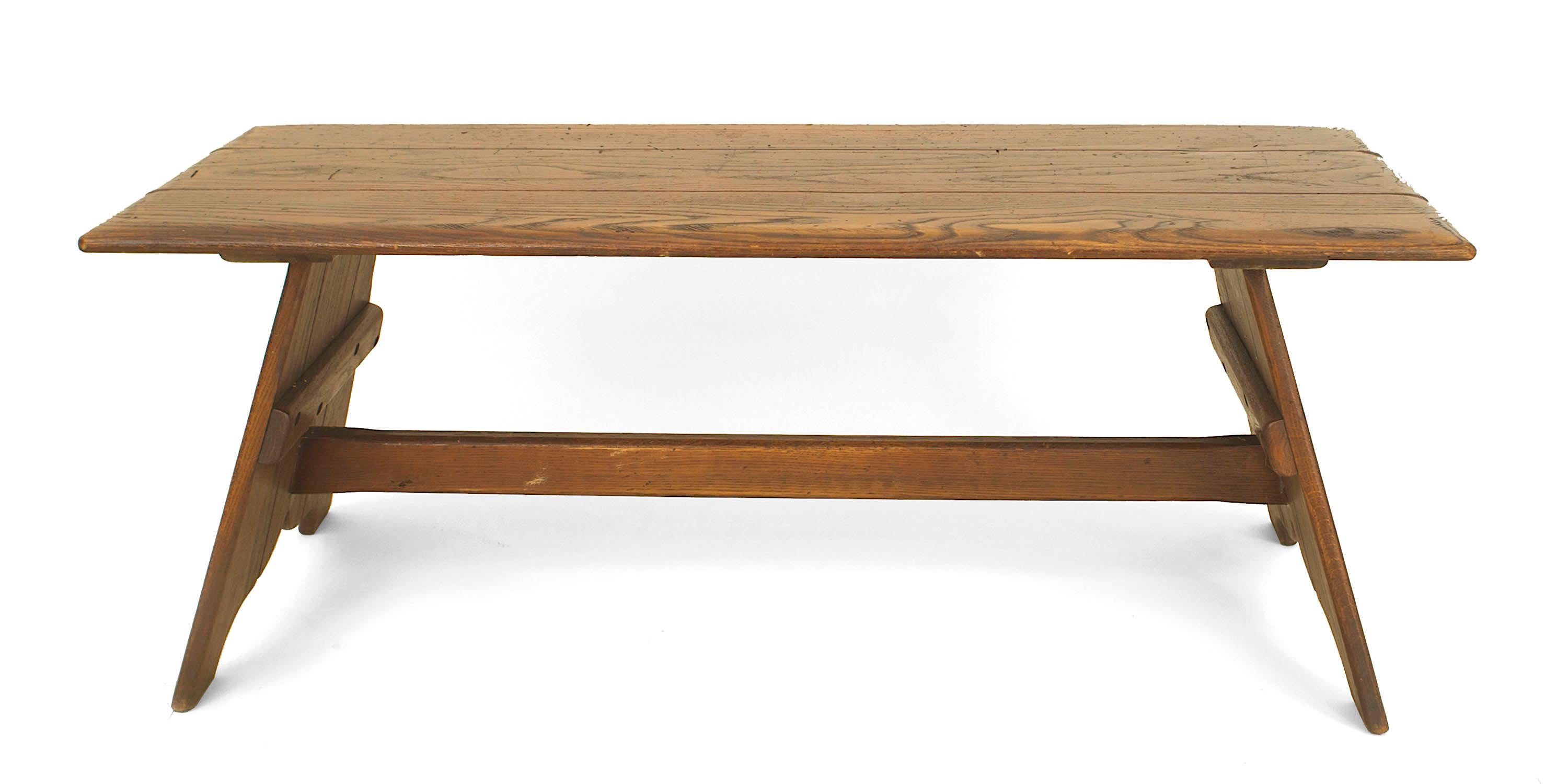 American Rustic Old Hickory Mission style rectangular coffee table having a pair of shaped pedestal base sides connected with a stretcher.


Since 1899 Old Hickory Furniture has been handcrafted in Central Indiana using the remarkable hickory