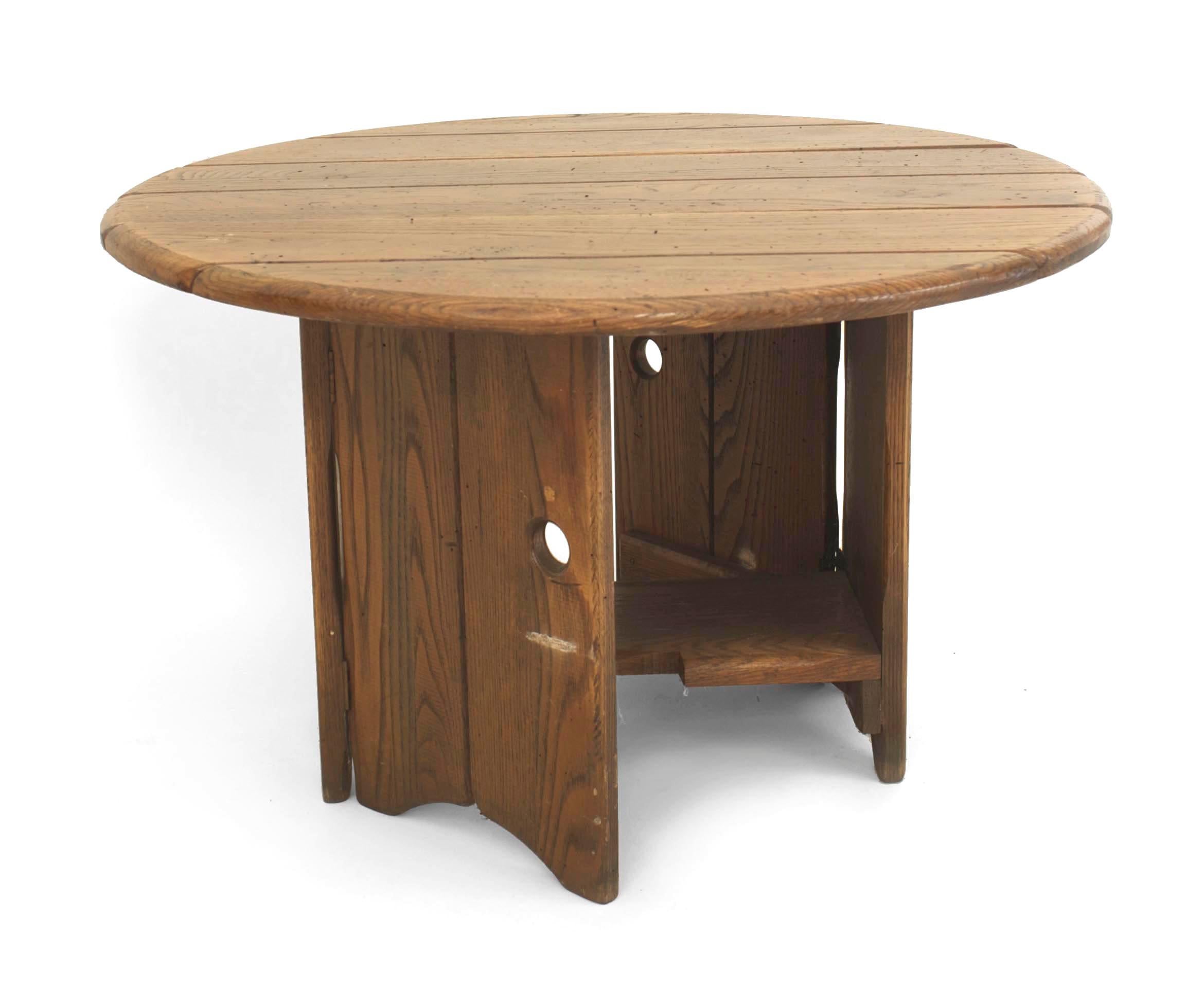 American Mission-style Rustic Old Hickory round coffee table with a slat top with two drop leaves, a gate leg base and an interior shelf stretcher. (American Provincial label; OLD HICKORY brand)
