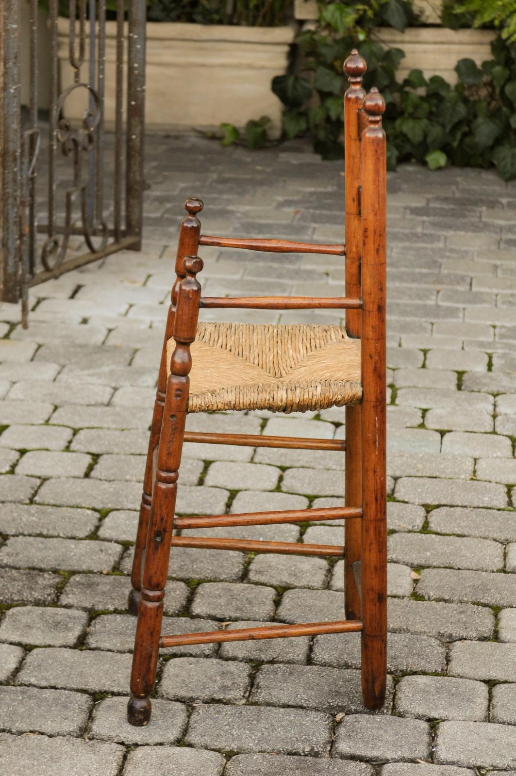 American Rustic Pine Child's High Chair with Rush Seat, Early 20th Century In Good Condition For Sale In Atlanta, GA